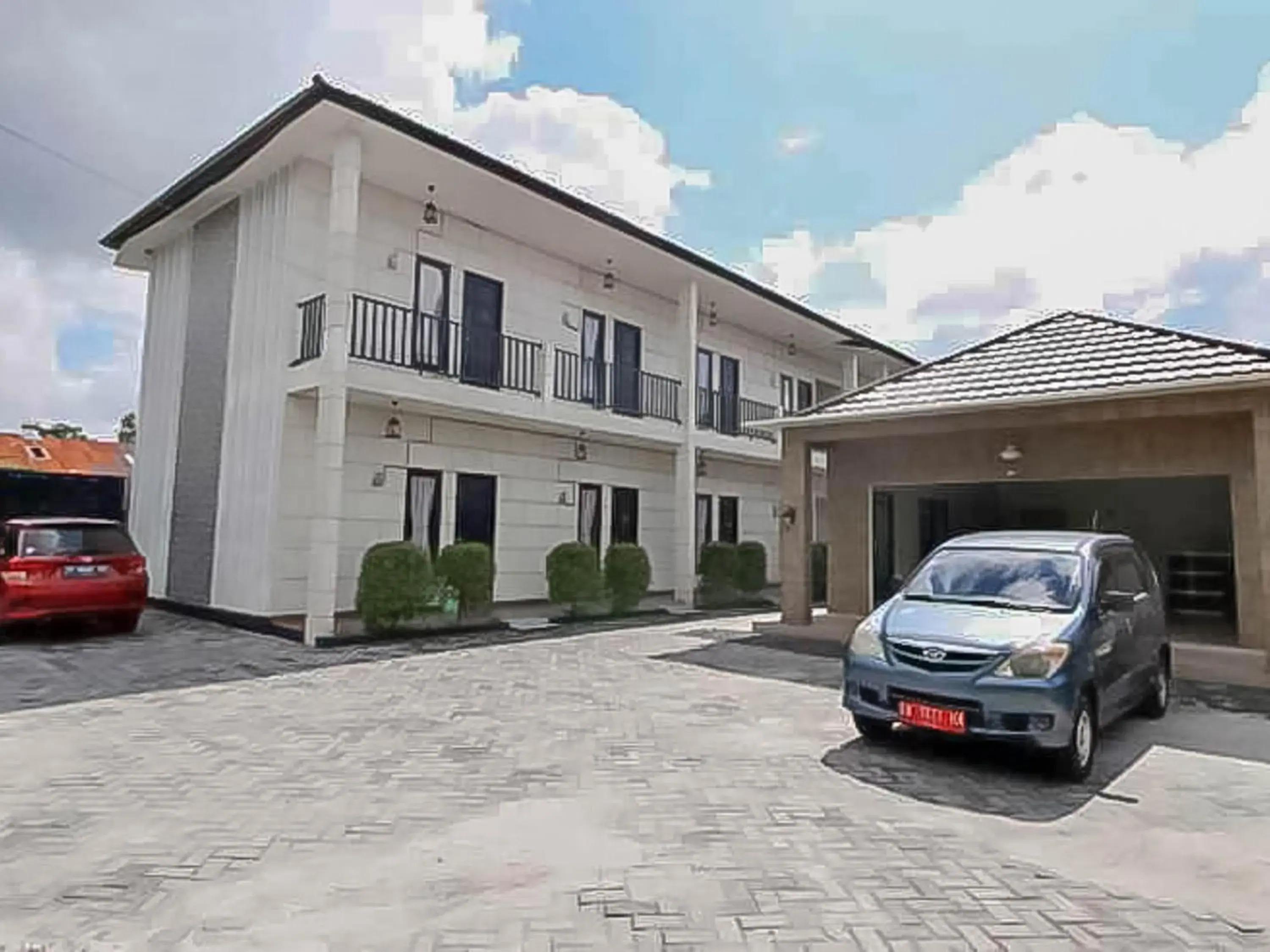 Facade/entrance in RedDoorz @ Wisma Pangrango Facade/entrance in RedDoorz @ Wisma Pangrango