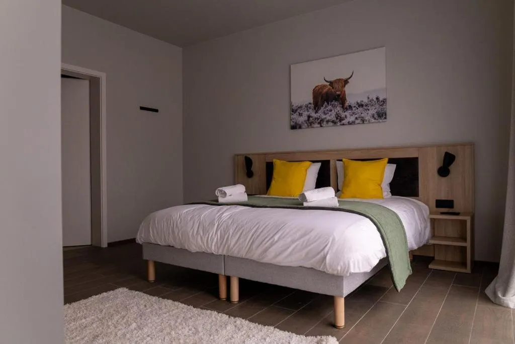 Bed in Les Chambres du Vieux Château