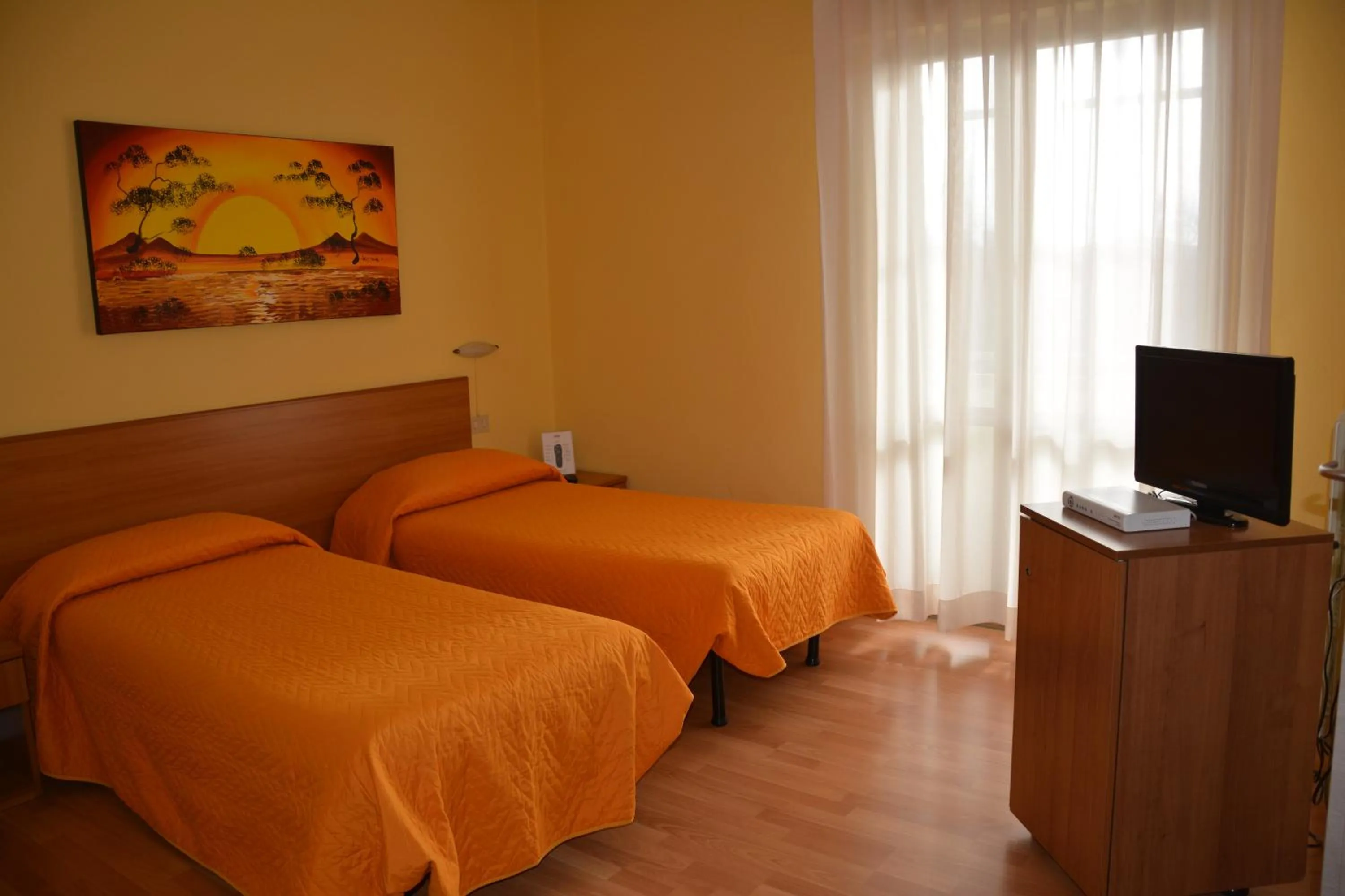 Bed in Piccolo Hotel