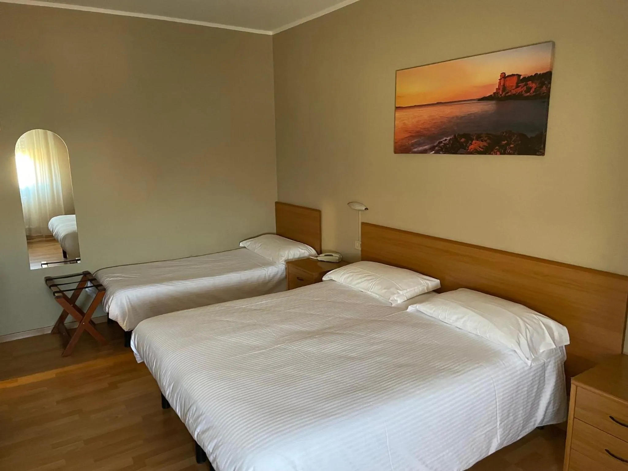 Bed in Piccolo Hotel