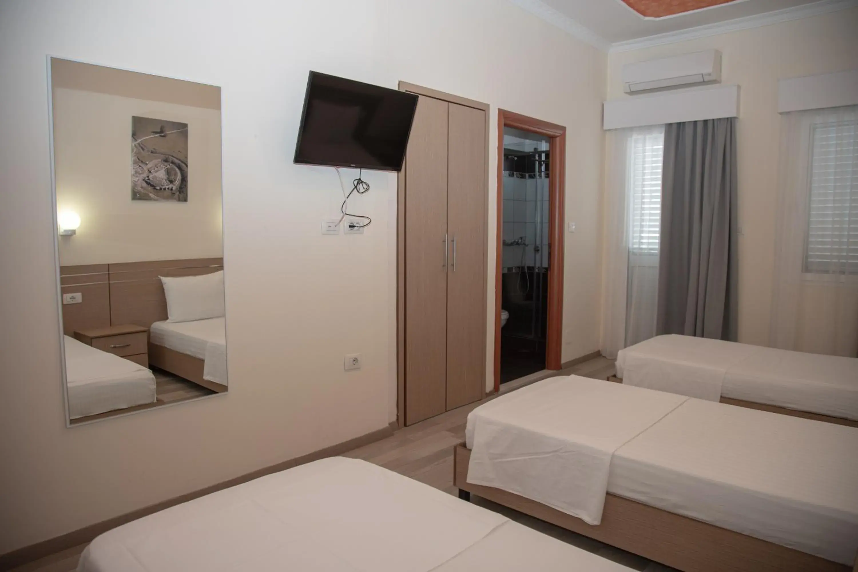 Triple Room in Hotel Number One Triple Room in Hotel Number One