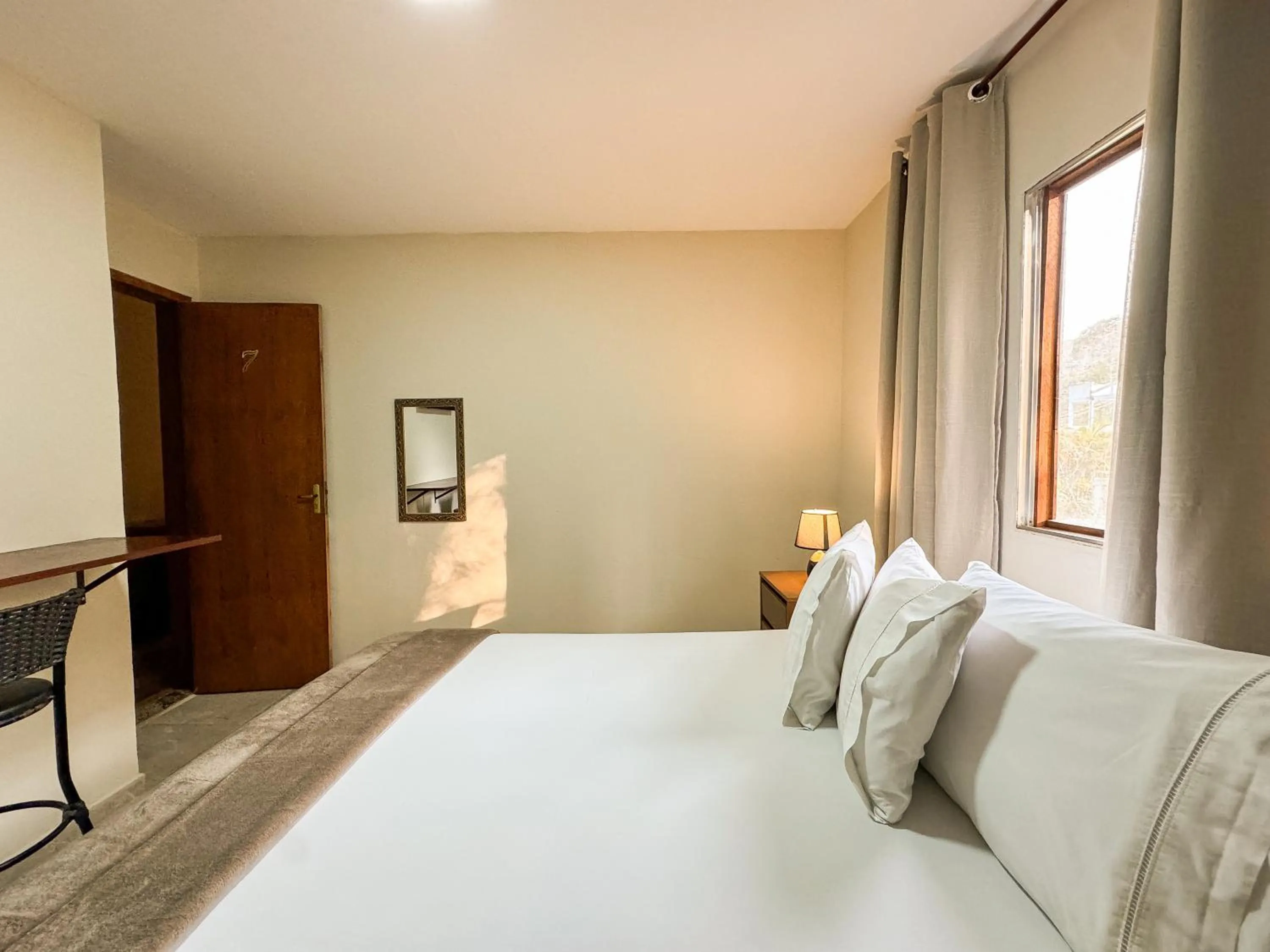 Bed in Pousada Entre Folhas