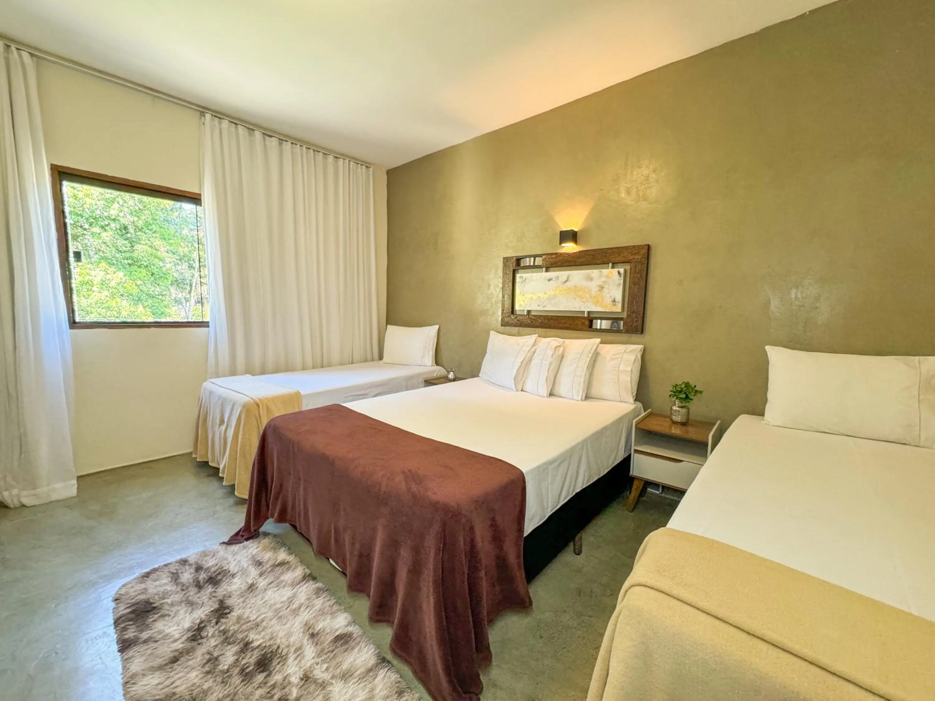 Bed in Pousada Entre Folhas