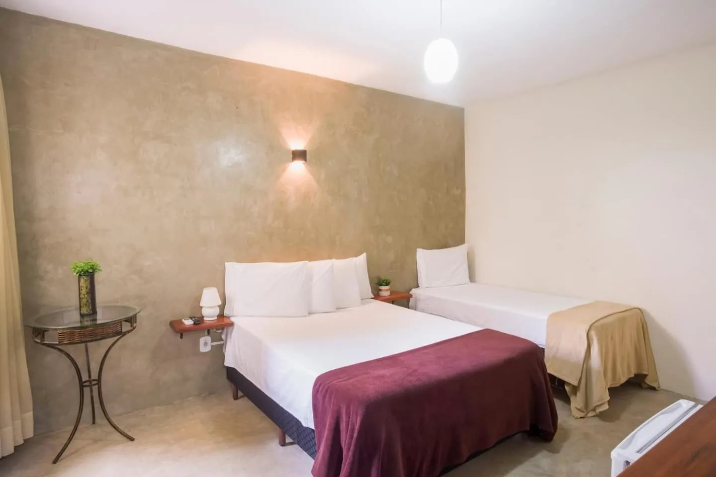 Bed in Pousada Entre Folhas