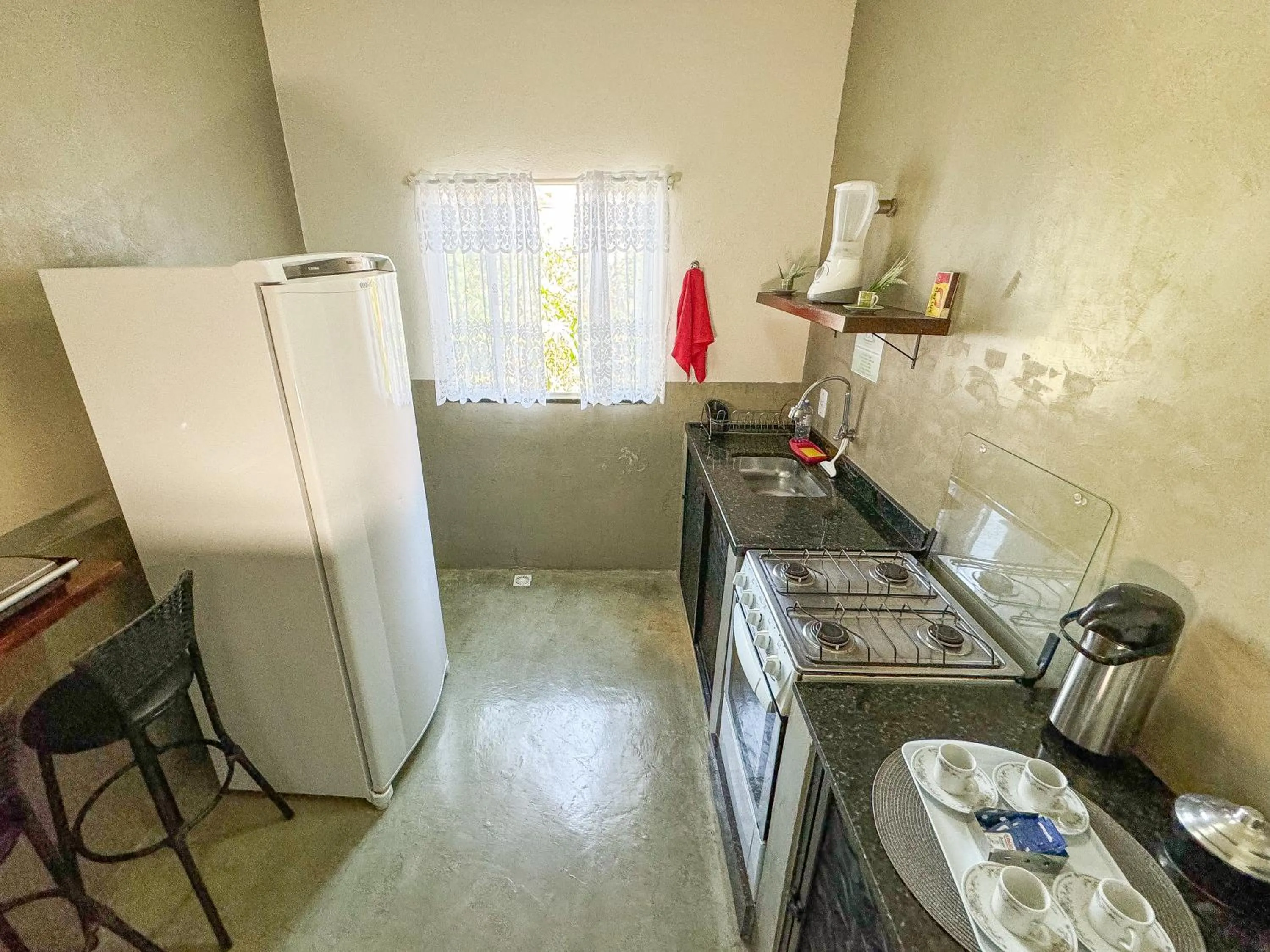 kitchen in Pousada Entre Folhas