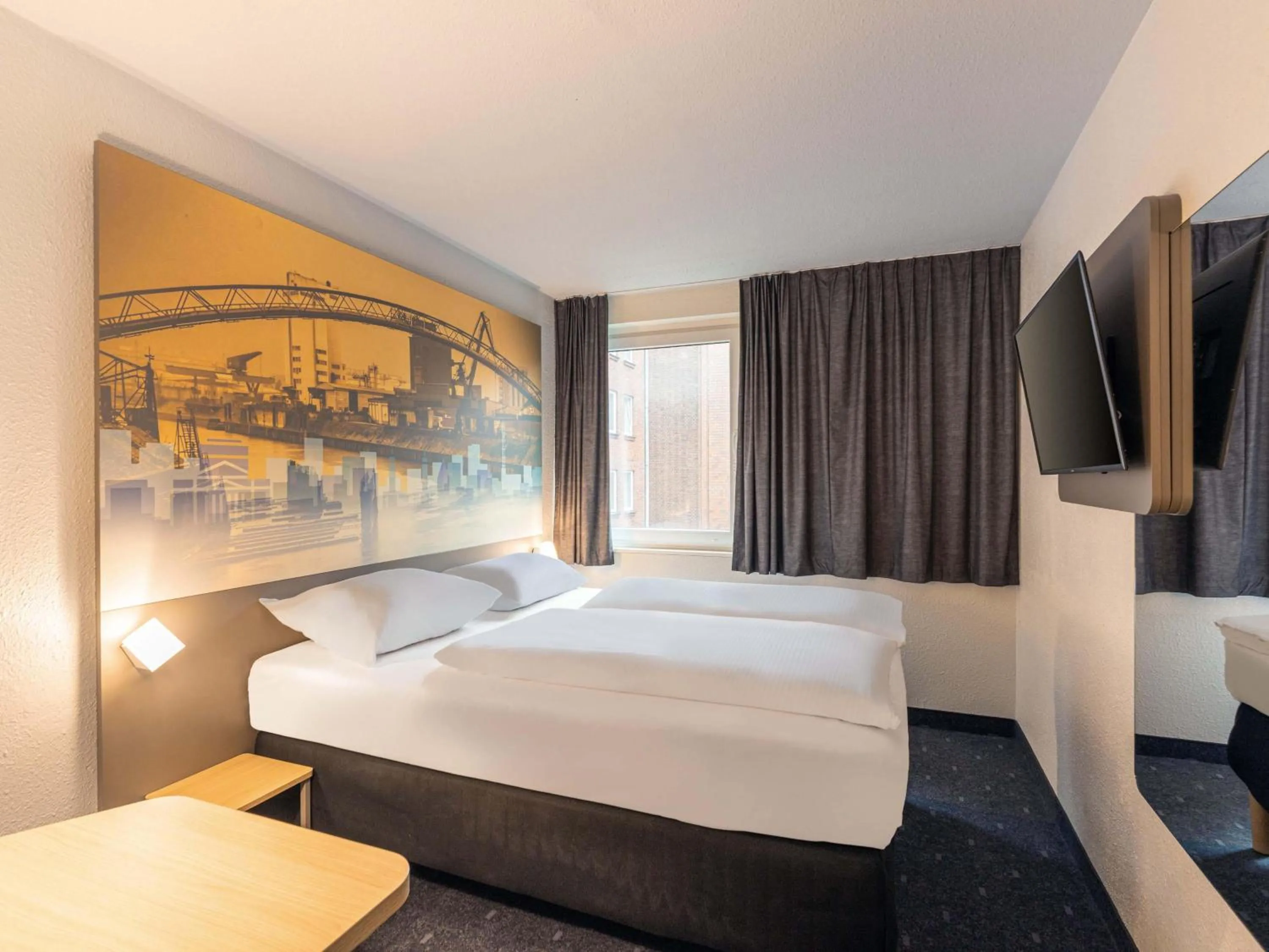 Photo of the whole room, Bed in B&B Hotel Duisburg Hbf-Nord