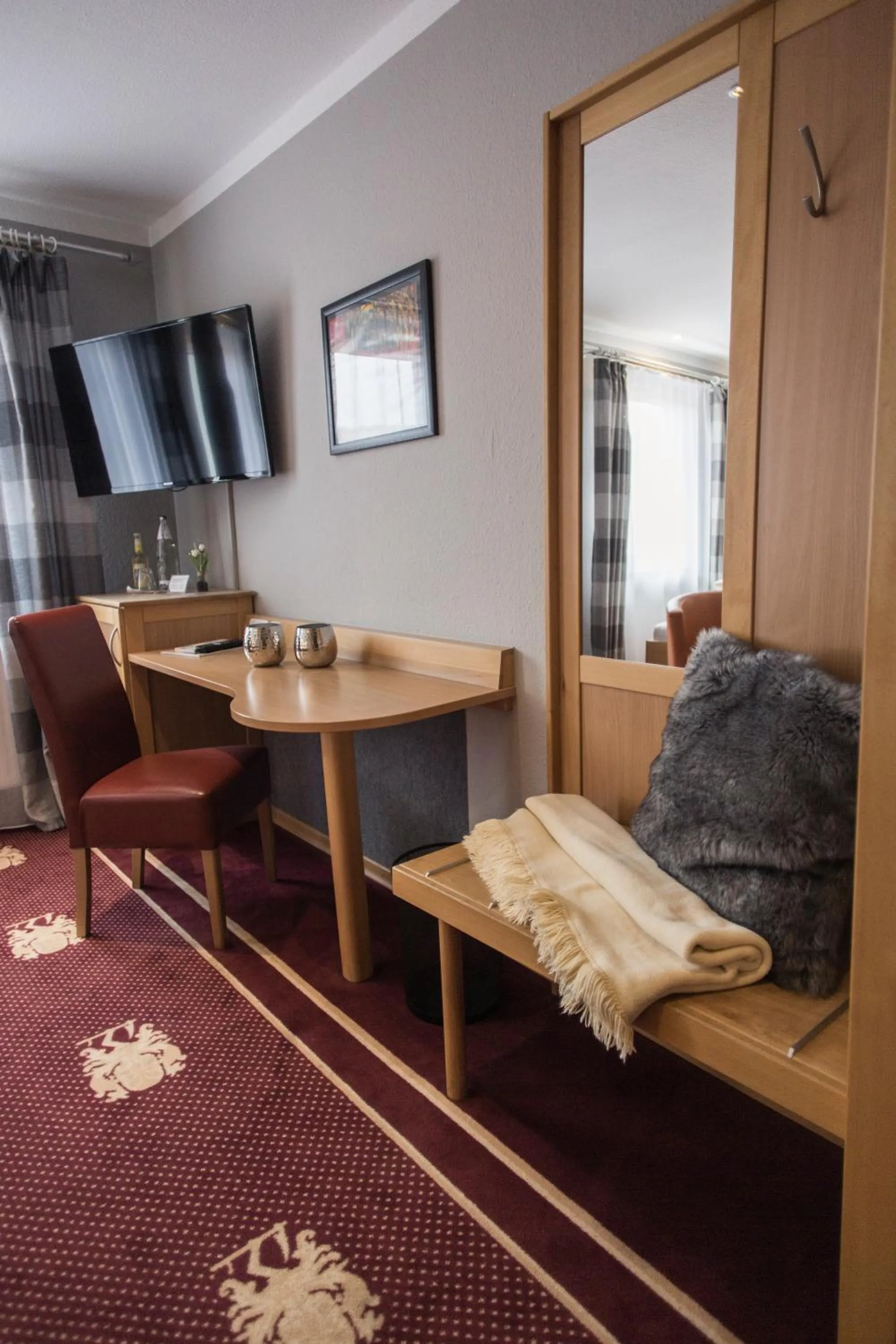 Seating area, Bed in Schwiizeralp Hotel & Restaurant