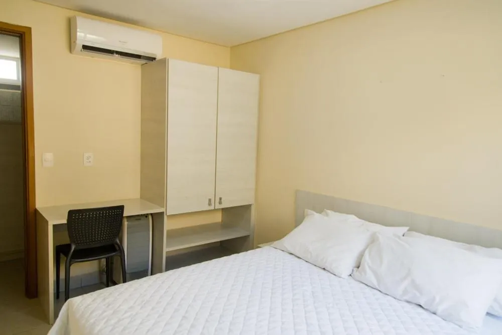 Bed in Pousada Água Viva