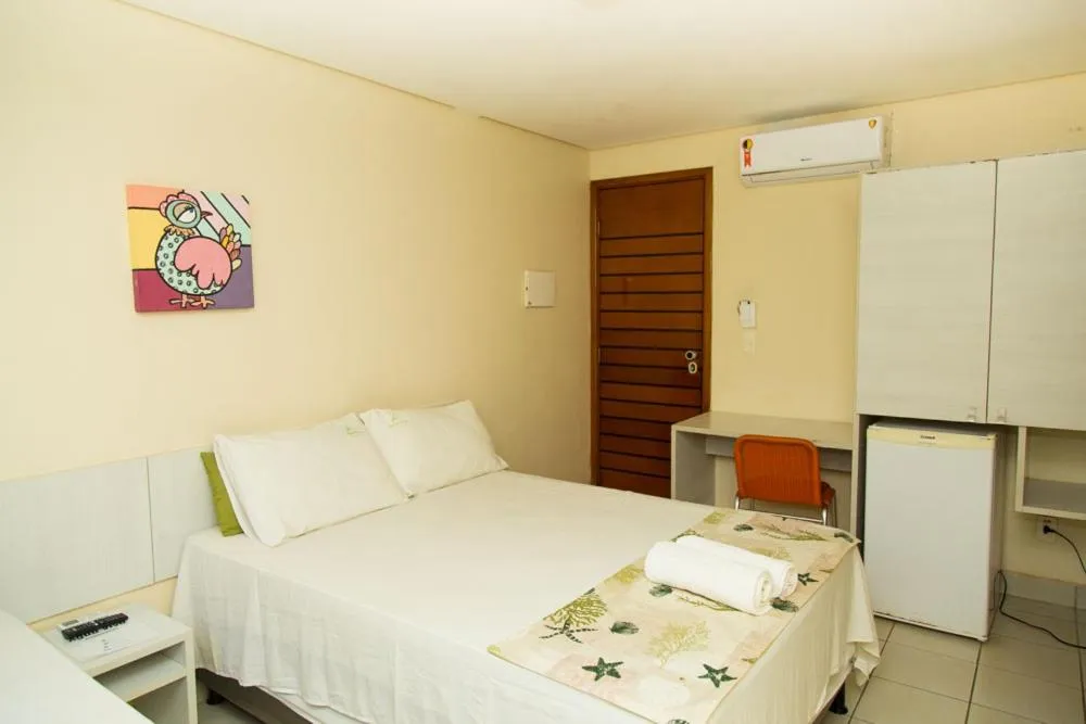 Bed in Pousada Água Viva