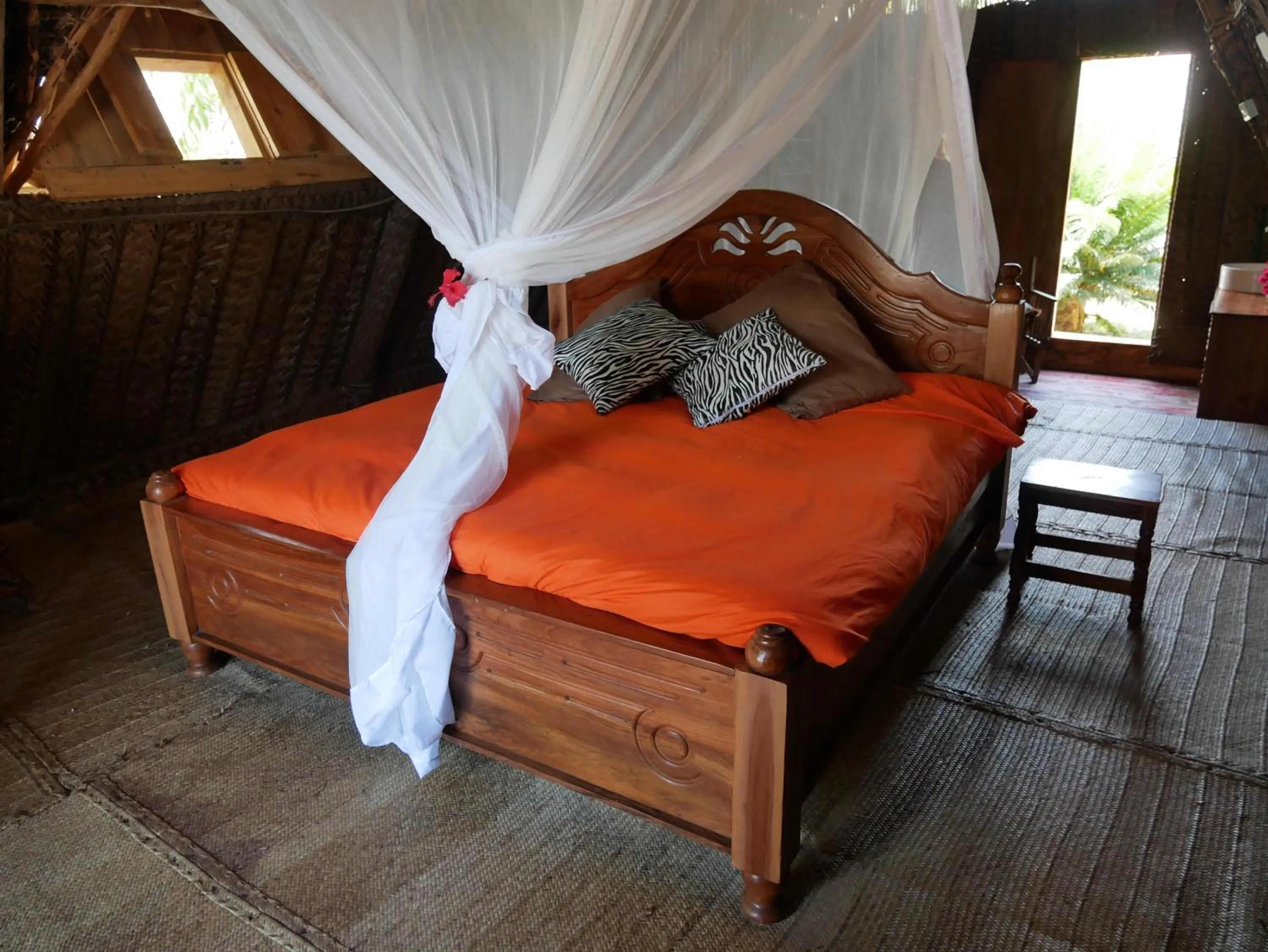 Bed in COCO REEF ECOLODGE
