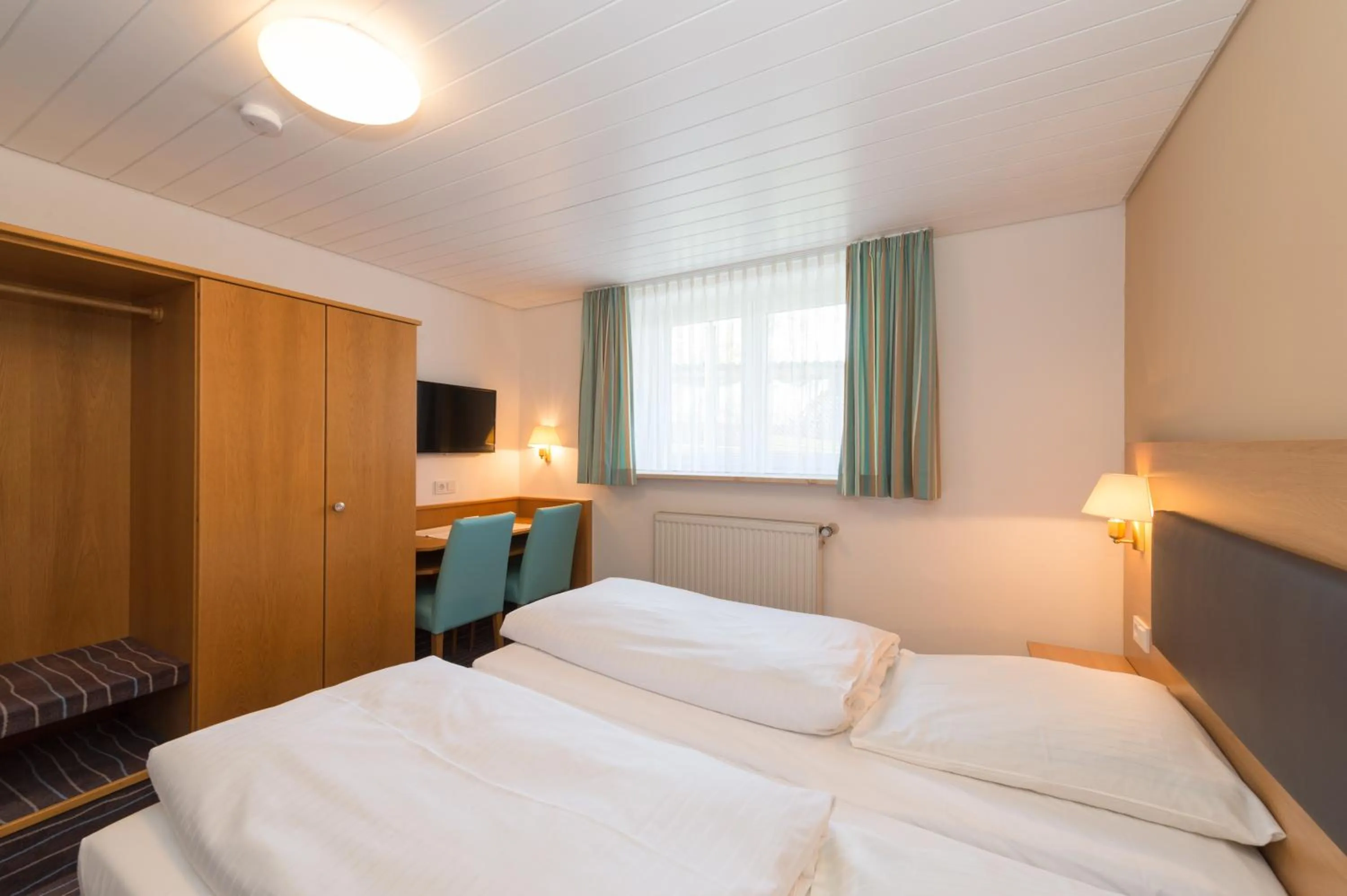 Bed in Hotel SCHNEIDER