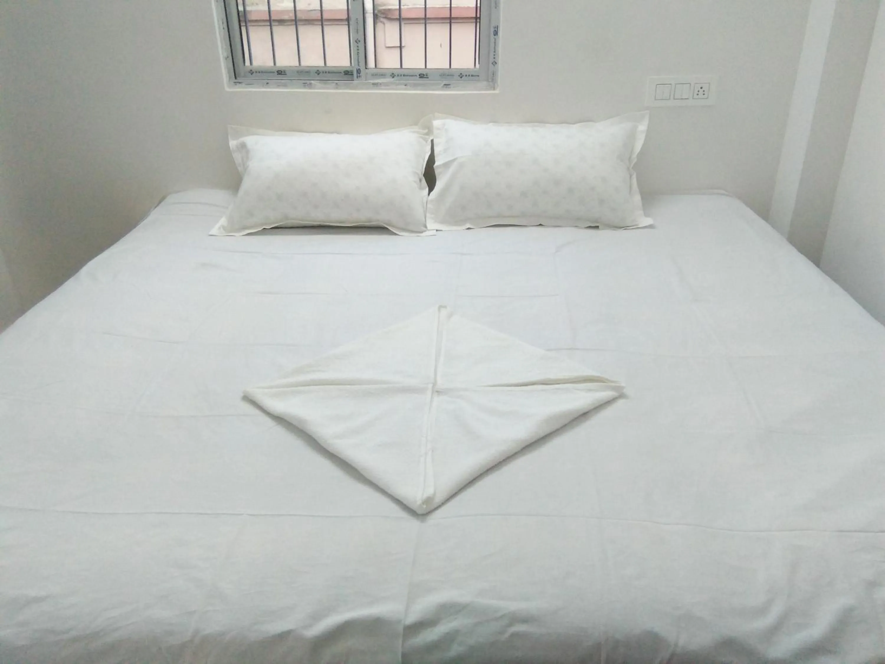 Bed in Sukun Guest House