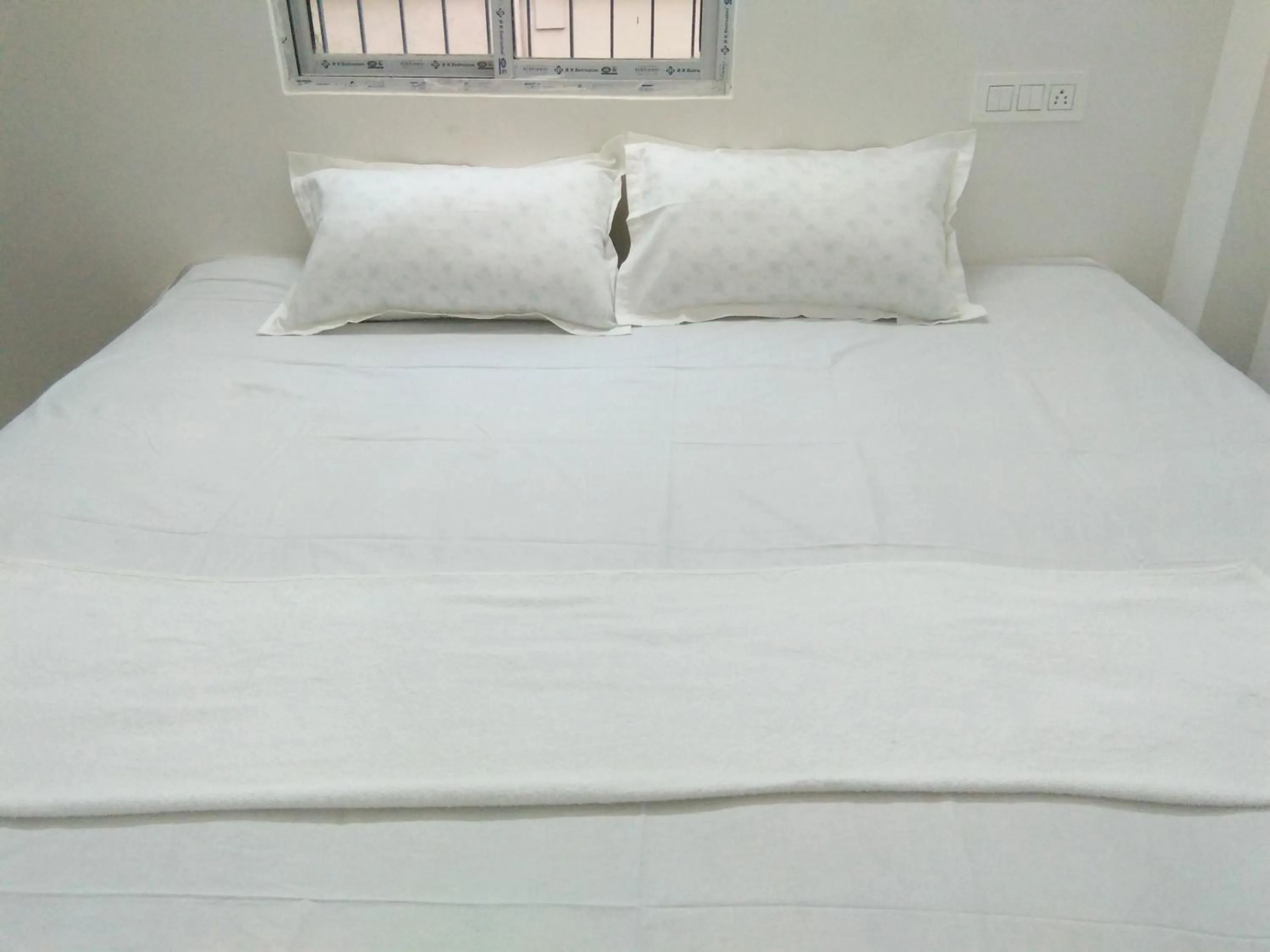 Bed in Sukun Guest House