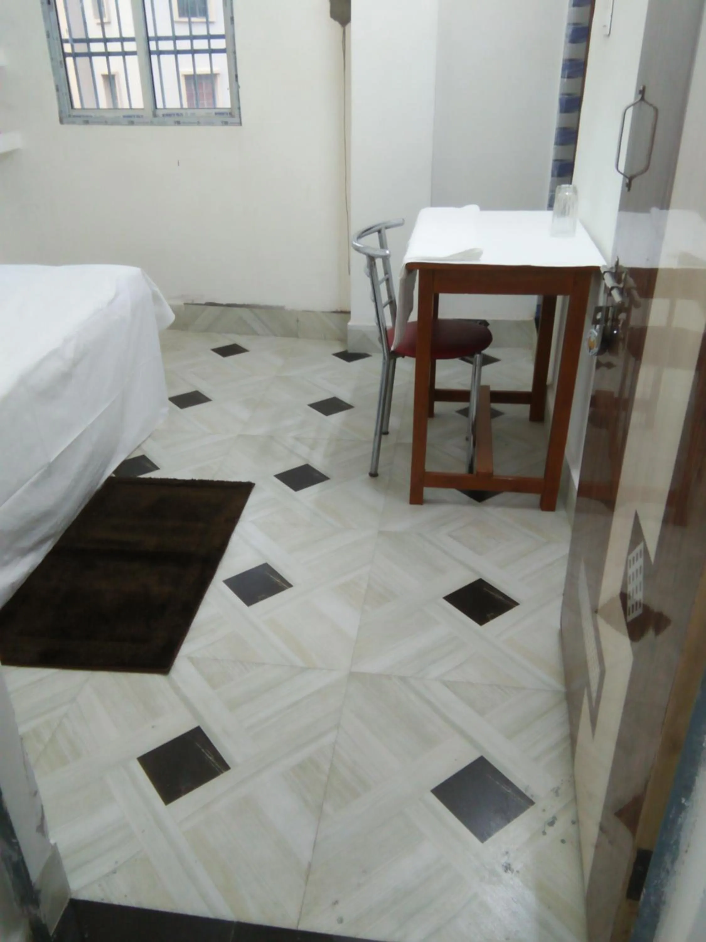 Bed in Sukun Guest House