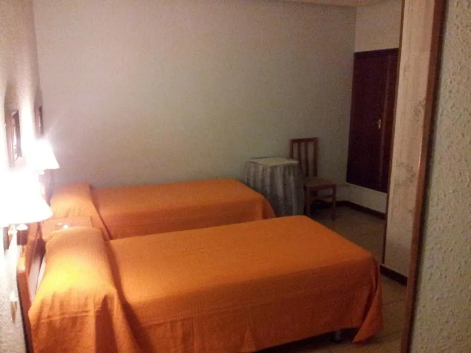 Bed in Hostal El Centro