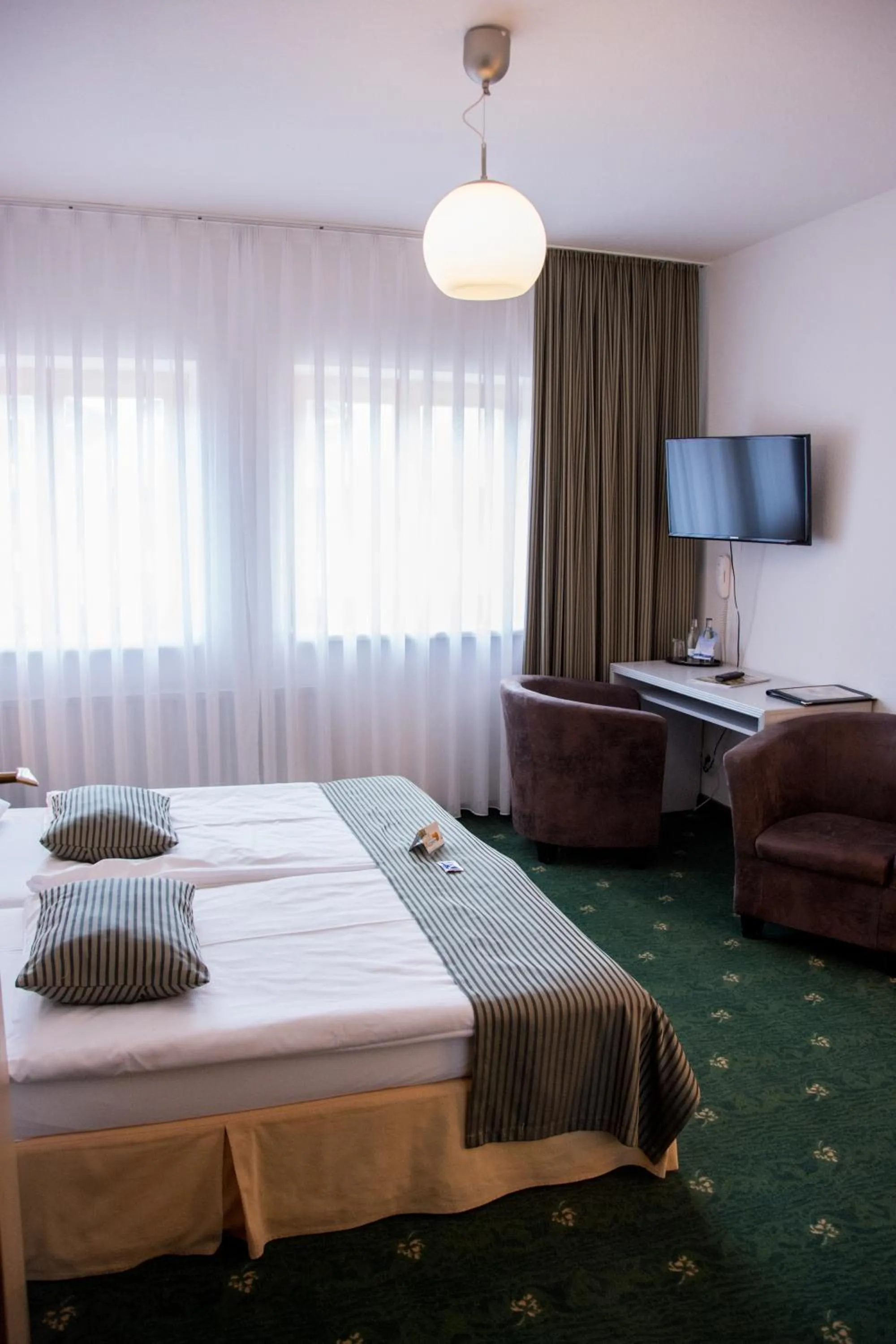 Photo of the whole room, Bed in Akzent Berghotel Rosstrappe