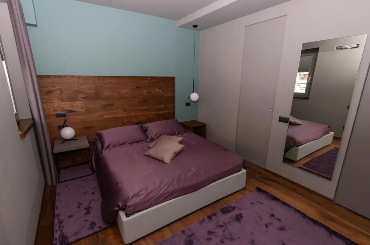 Bed in Fiorini Rooms Pescasseroli