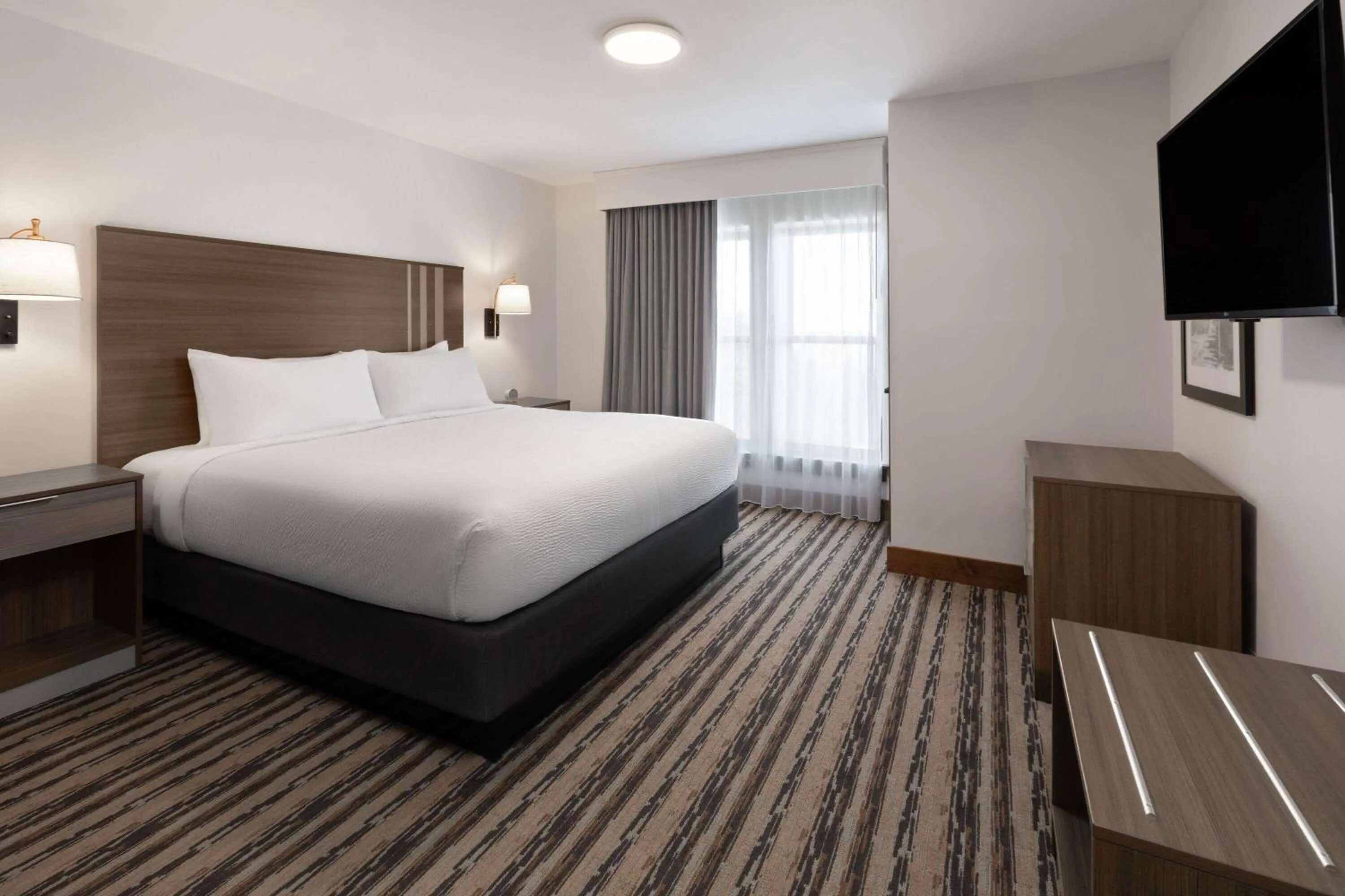 Photo of the whole room, Bed in Corduroy Inn and Lodge, Trademark Collection by Wyndham