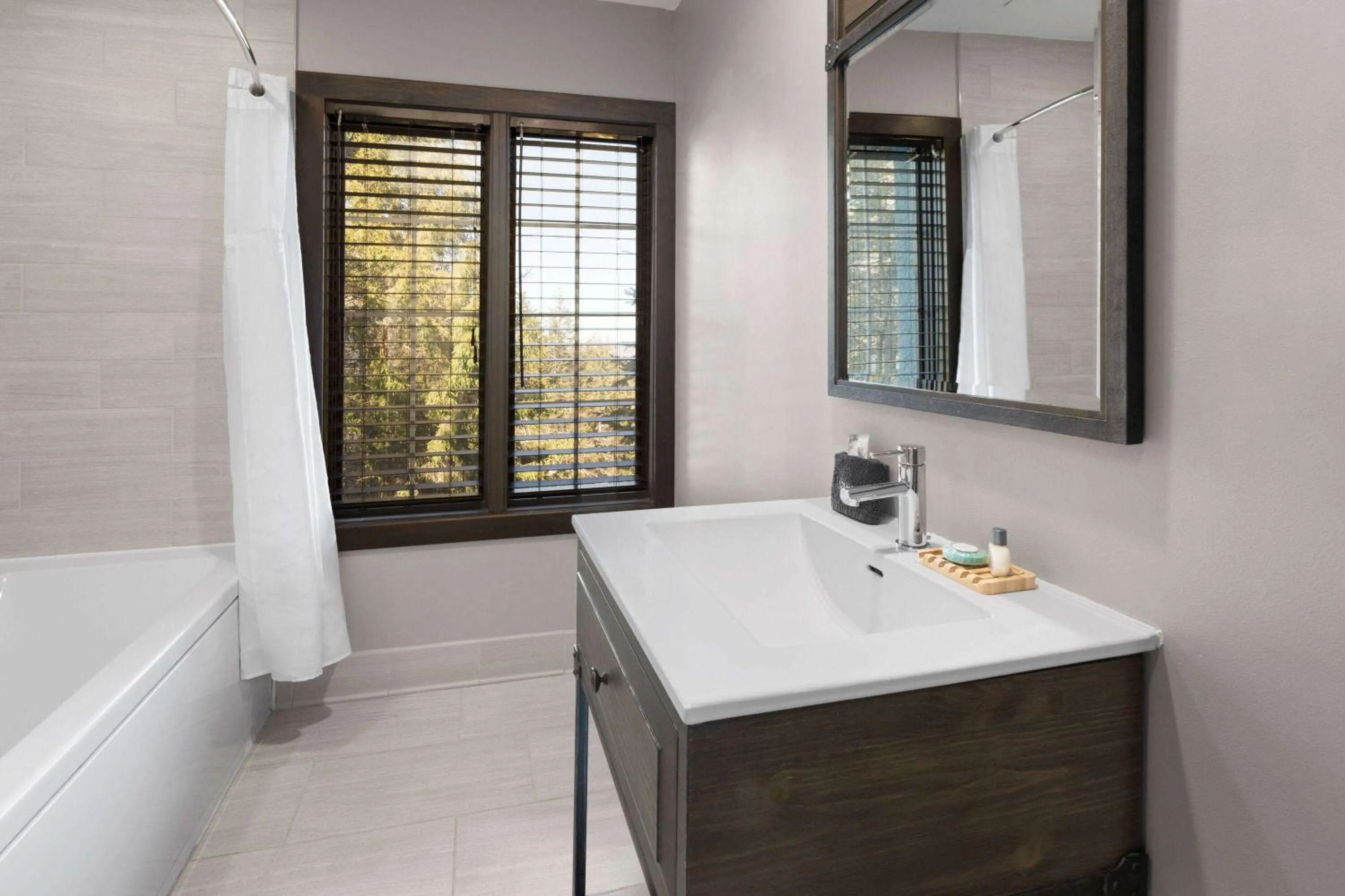 Bathroom in Corduroy Inn and Lodge, Trademark Collection by Wyndham