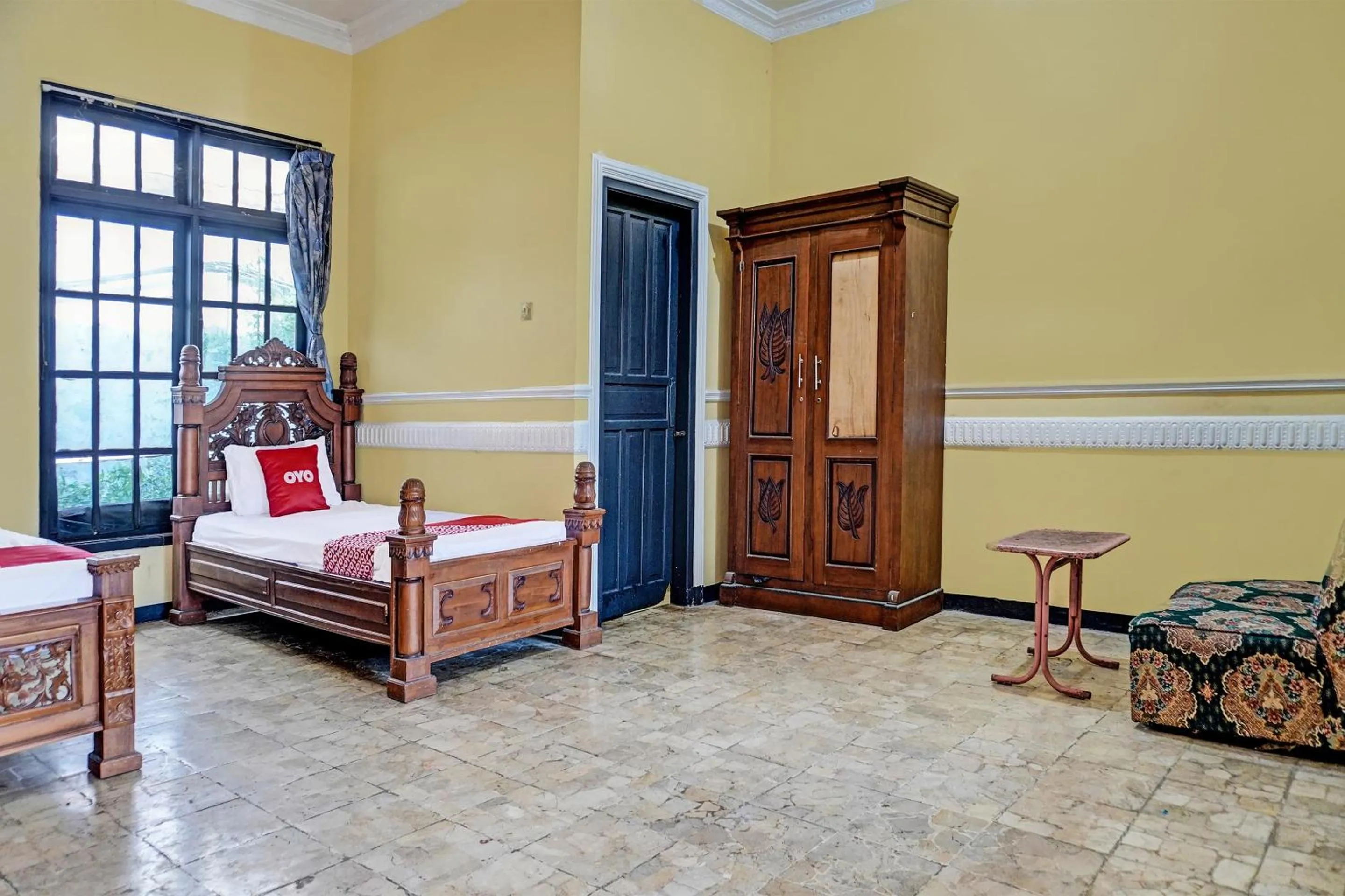 Bedroom in SPOT ON 91798 Hotel Grand Mutiara