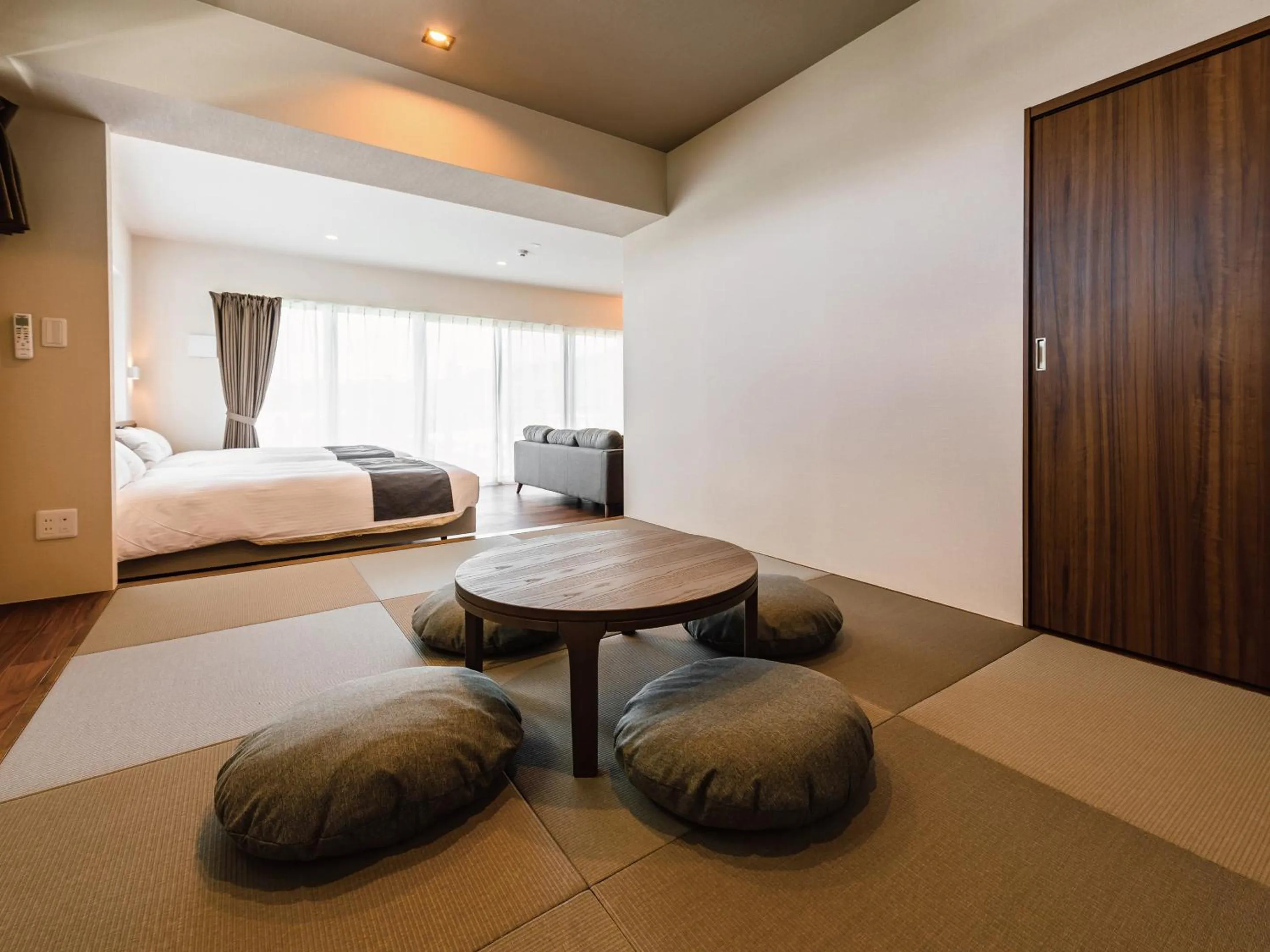 Photo of the whole room, Bed in Private Condo Chatan Jagaru by Coldio Premium