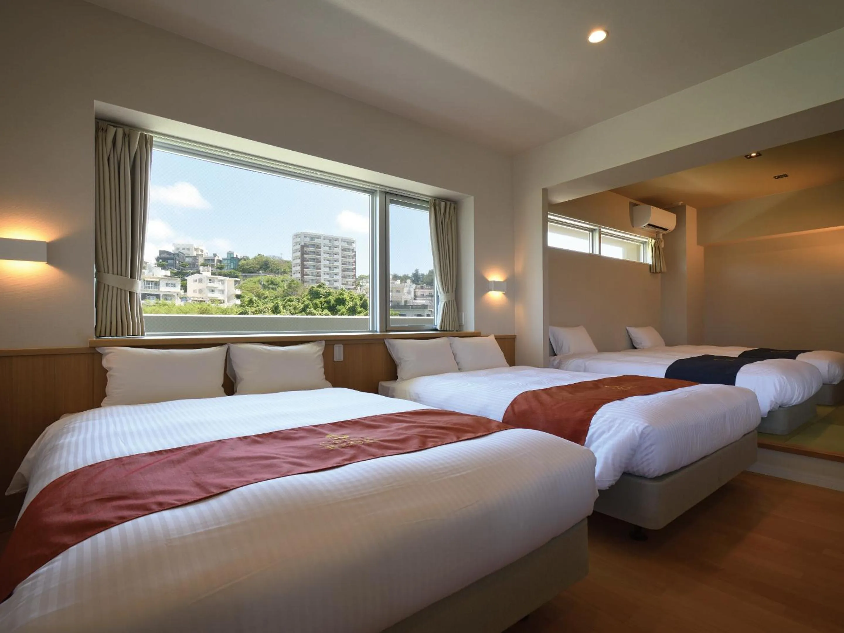Photo of the whole room, Bed in Private Condo Chatan Jagaru by Coldio Premium