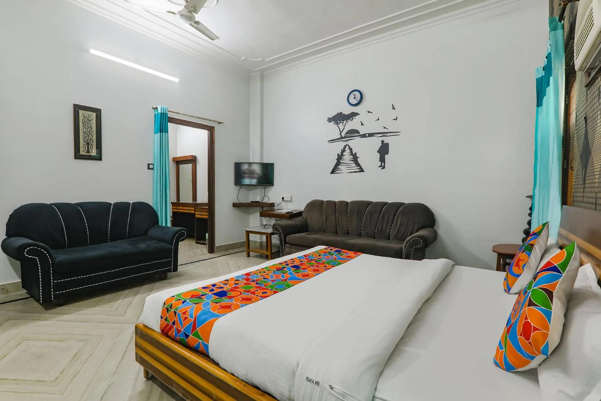 Bed in FabHotel Raka Inn