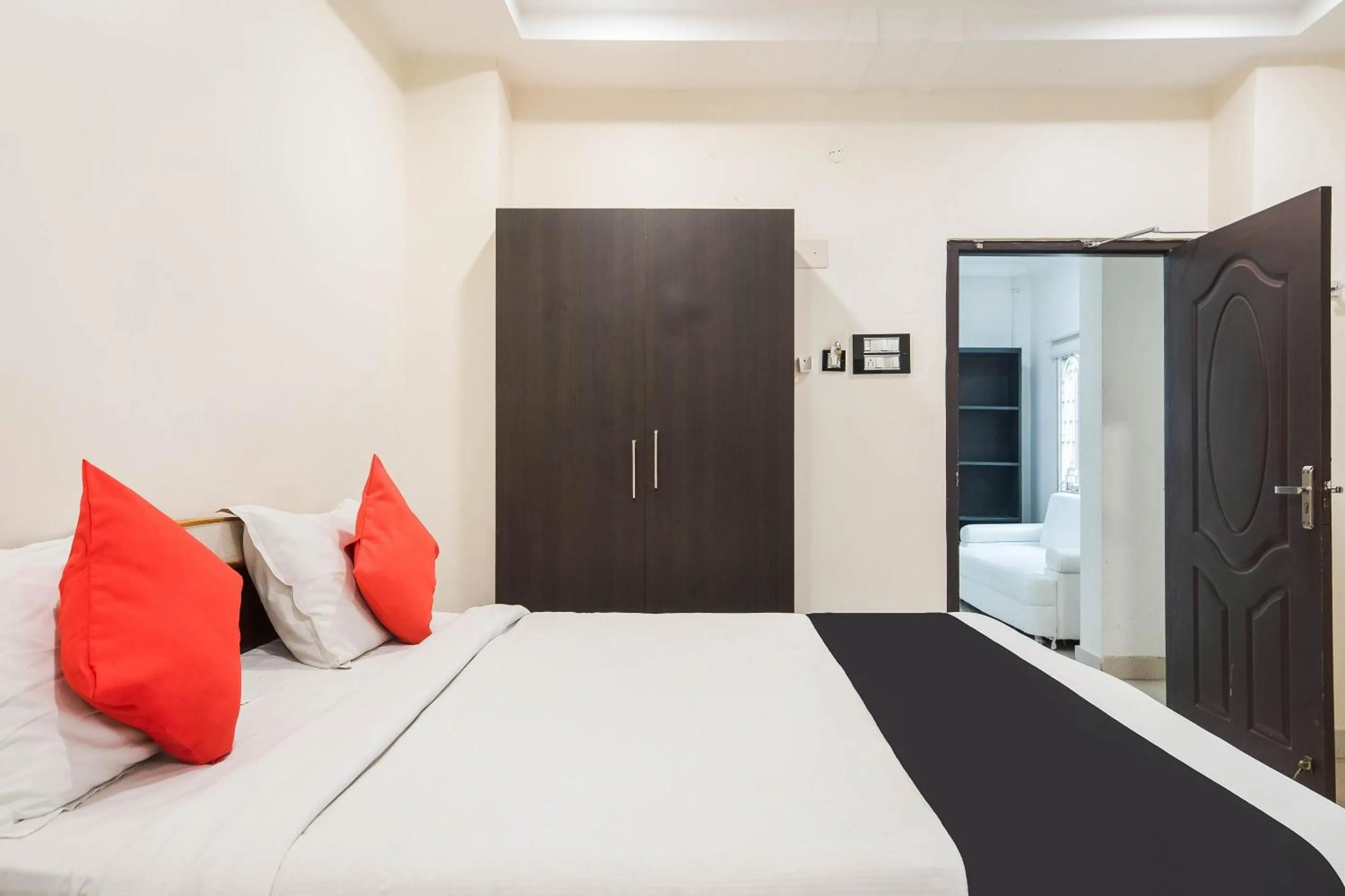 Bedroom in Capital O Aditya Grand