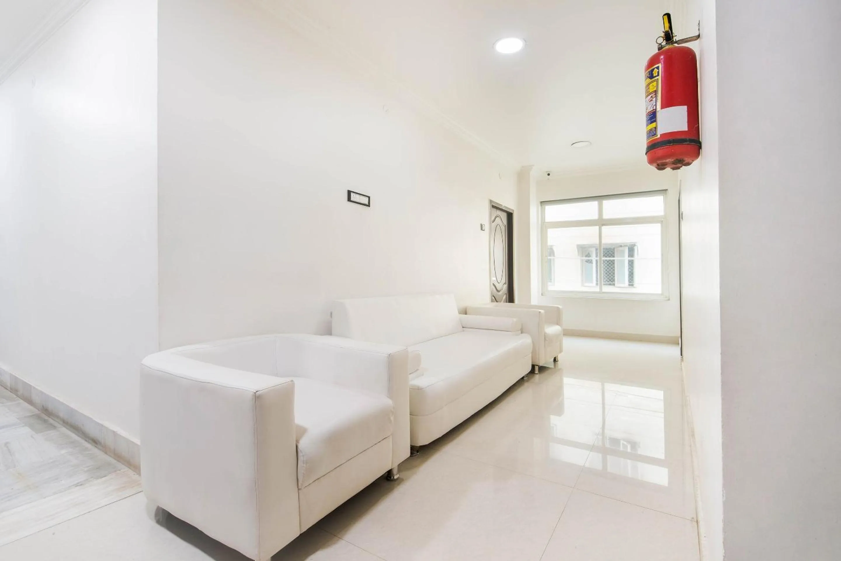 Lobby or reception, Bed in Capital O Aditya Grand