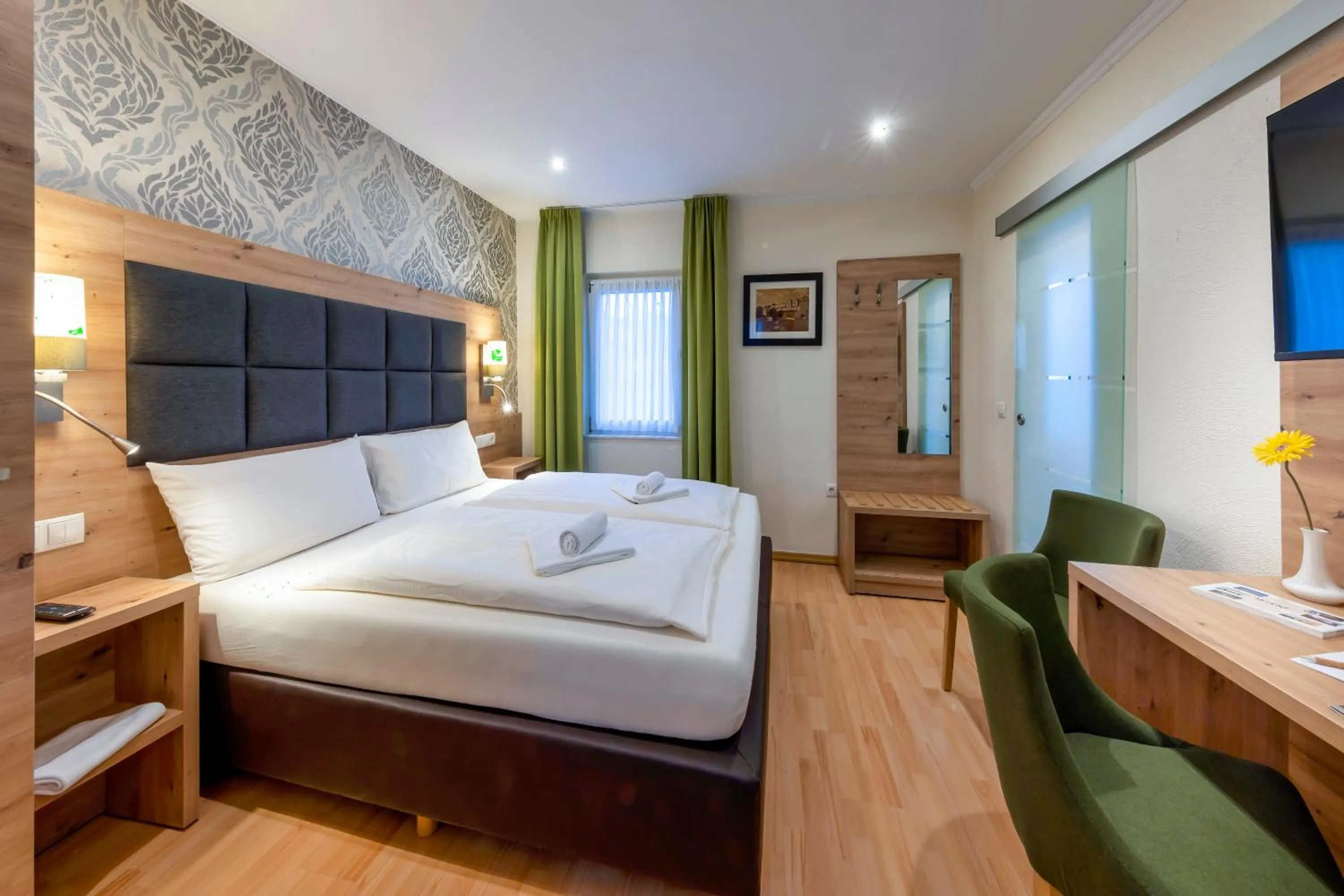 Bed in AKZENT Hotel Restaurant Roter Ochse Rhens bei Koblenz