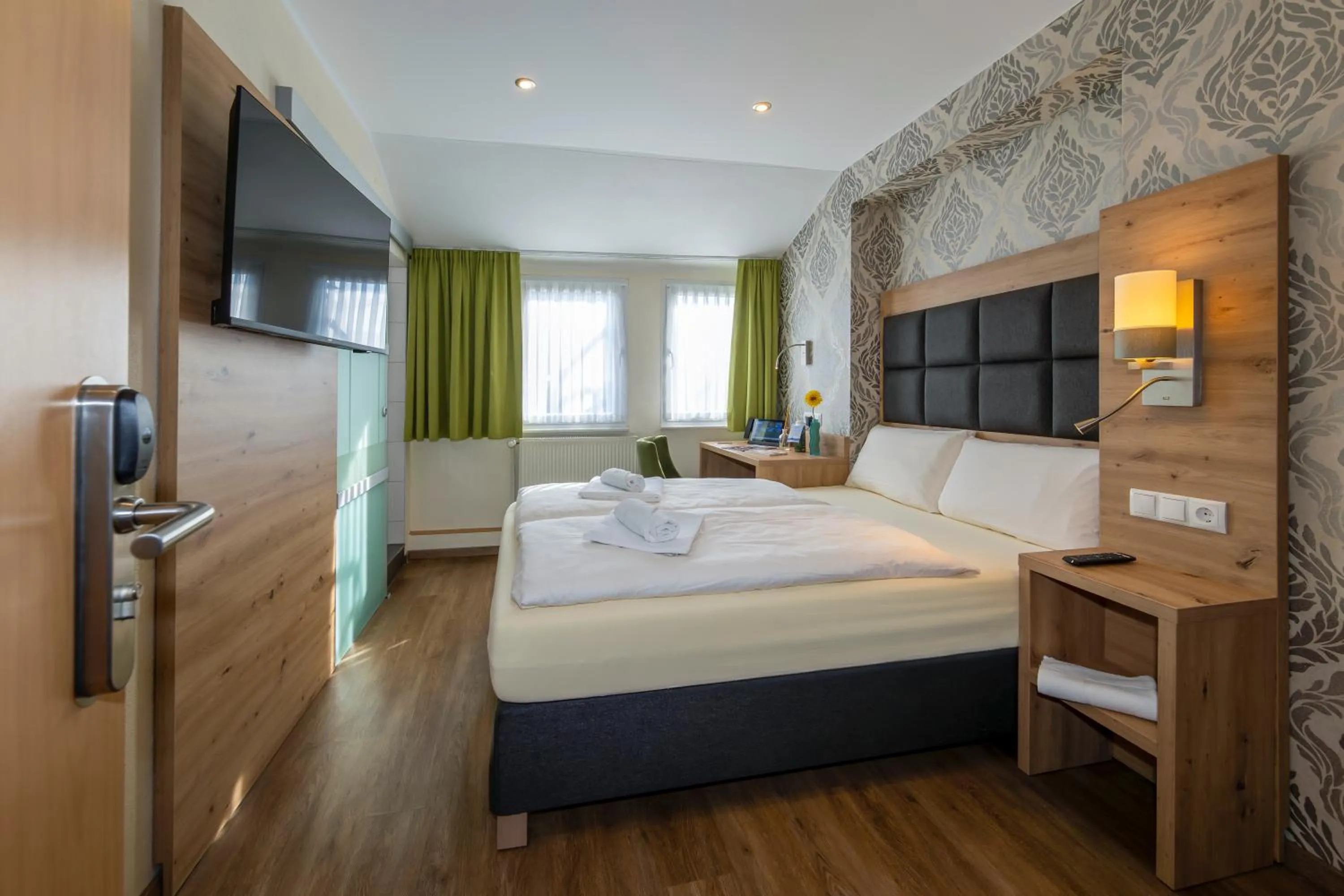 Bed in AKZENT Hotel Restaurant Roter Ochse Rhens bei Koblenz