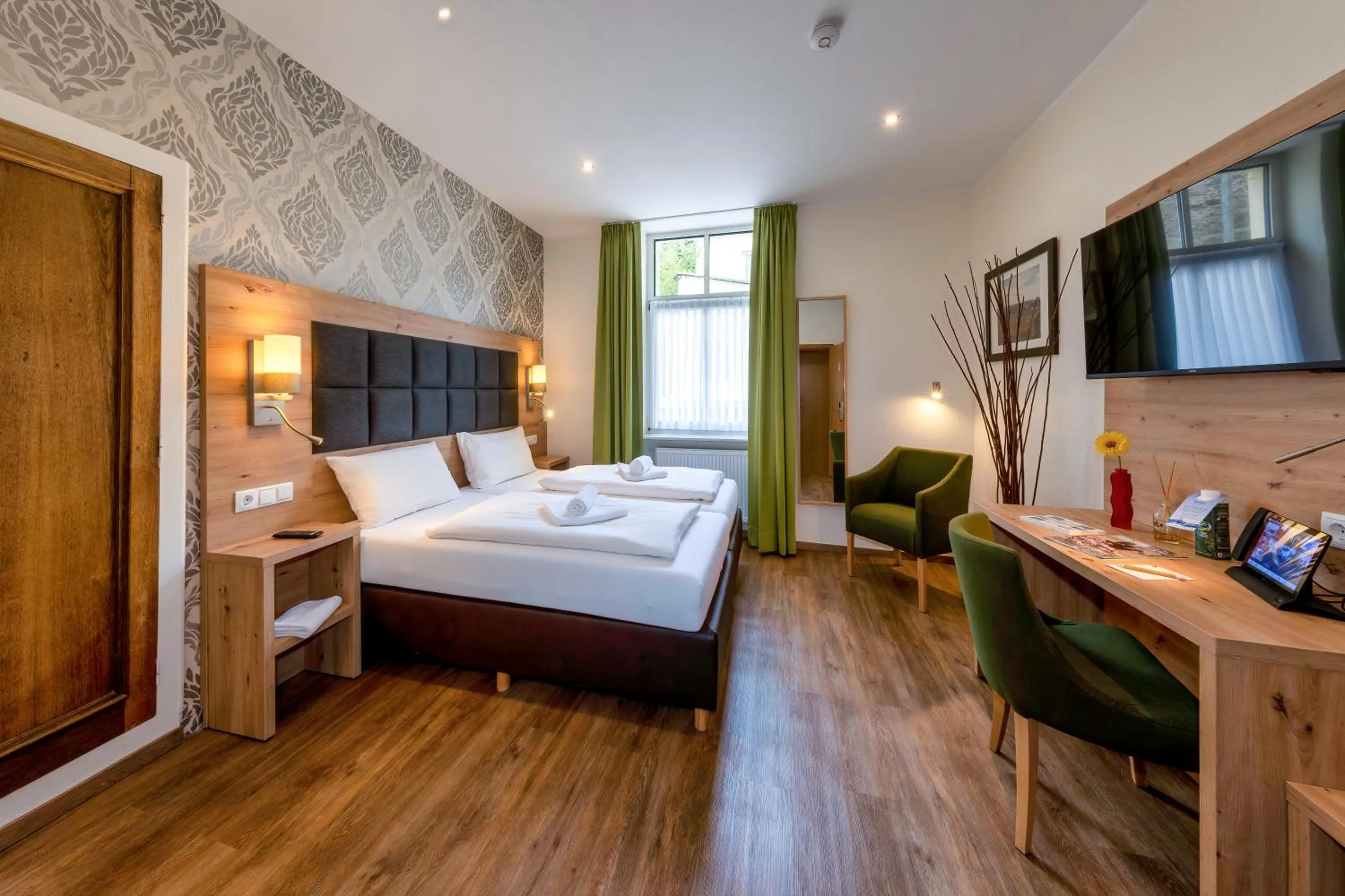 Bed in AKZENT Hotel Restaurant Roter Ochse Rhens bei Koblenz