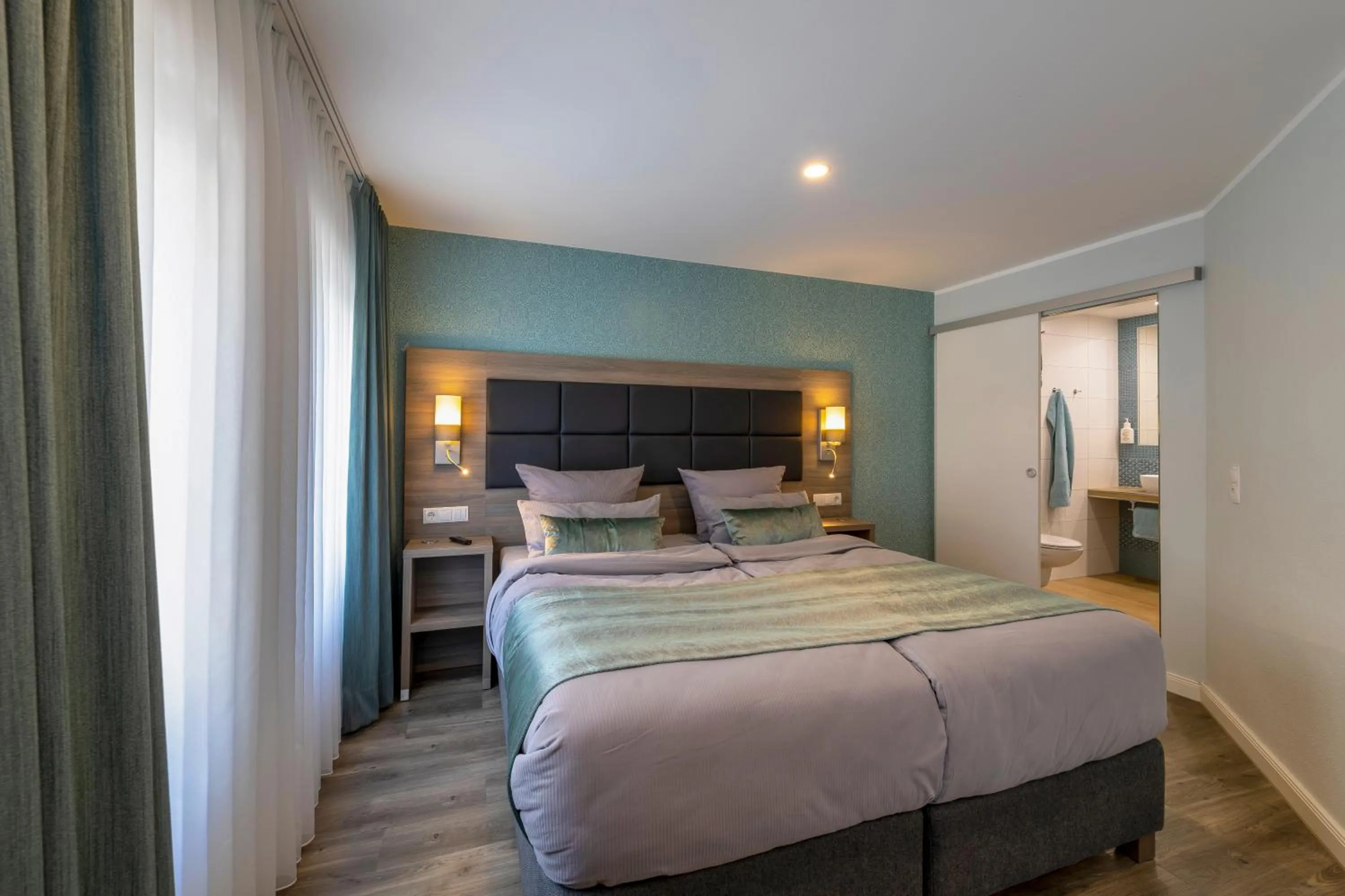 Bed in AKZENT Hotel Restaurant Roter Ochse Rhens bei Koblenz