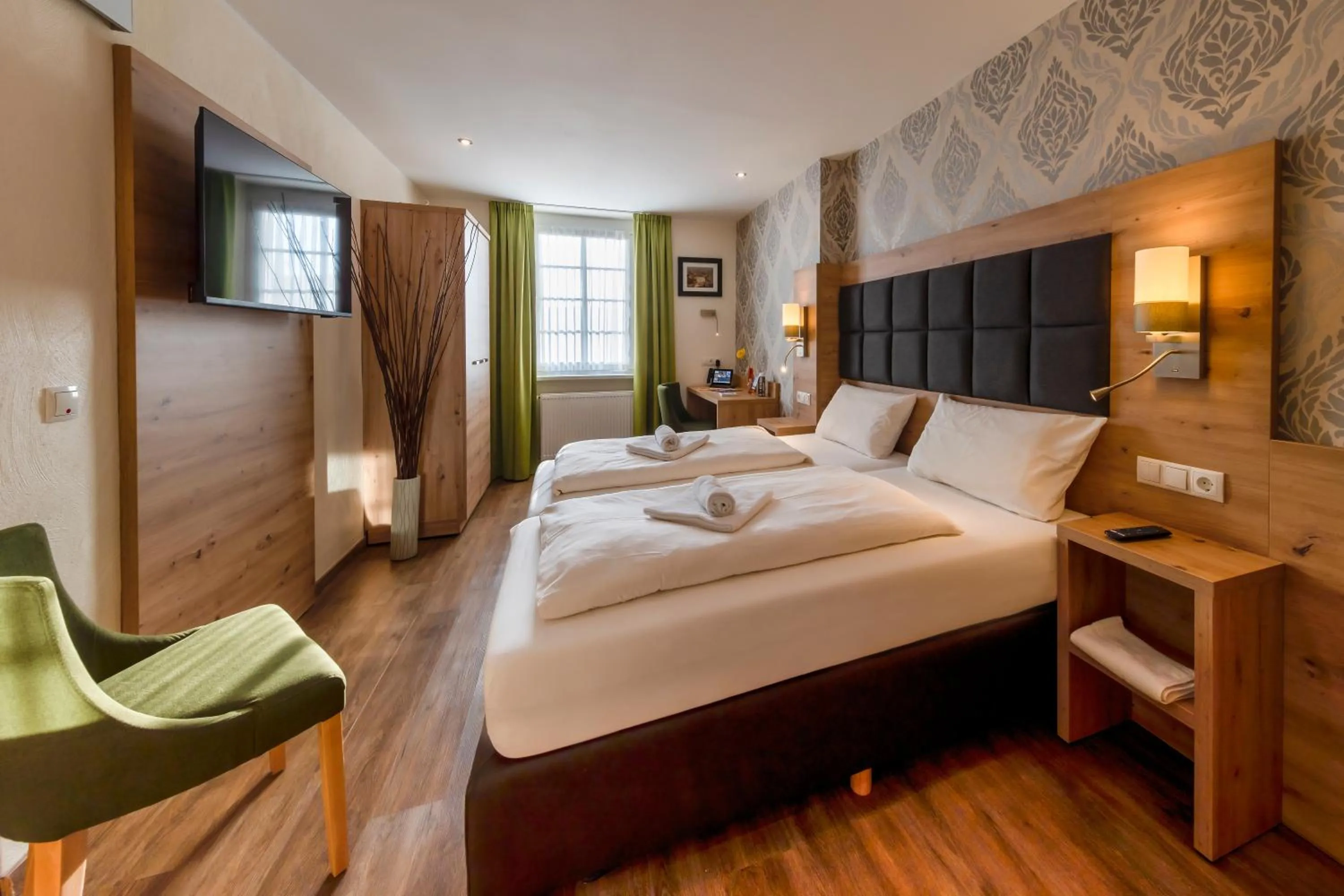 Bed in AKZENT Hotel Restaurant Roter Ochse Rhens bei Koblenz