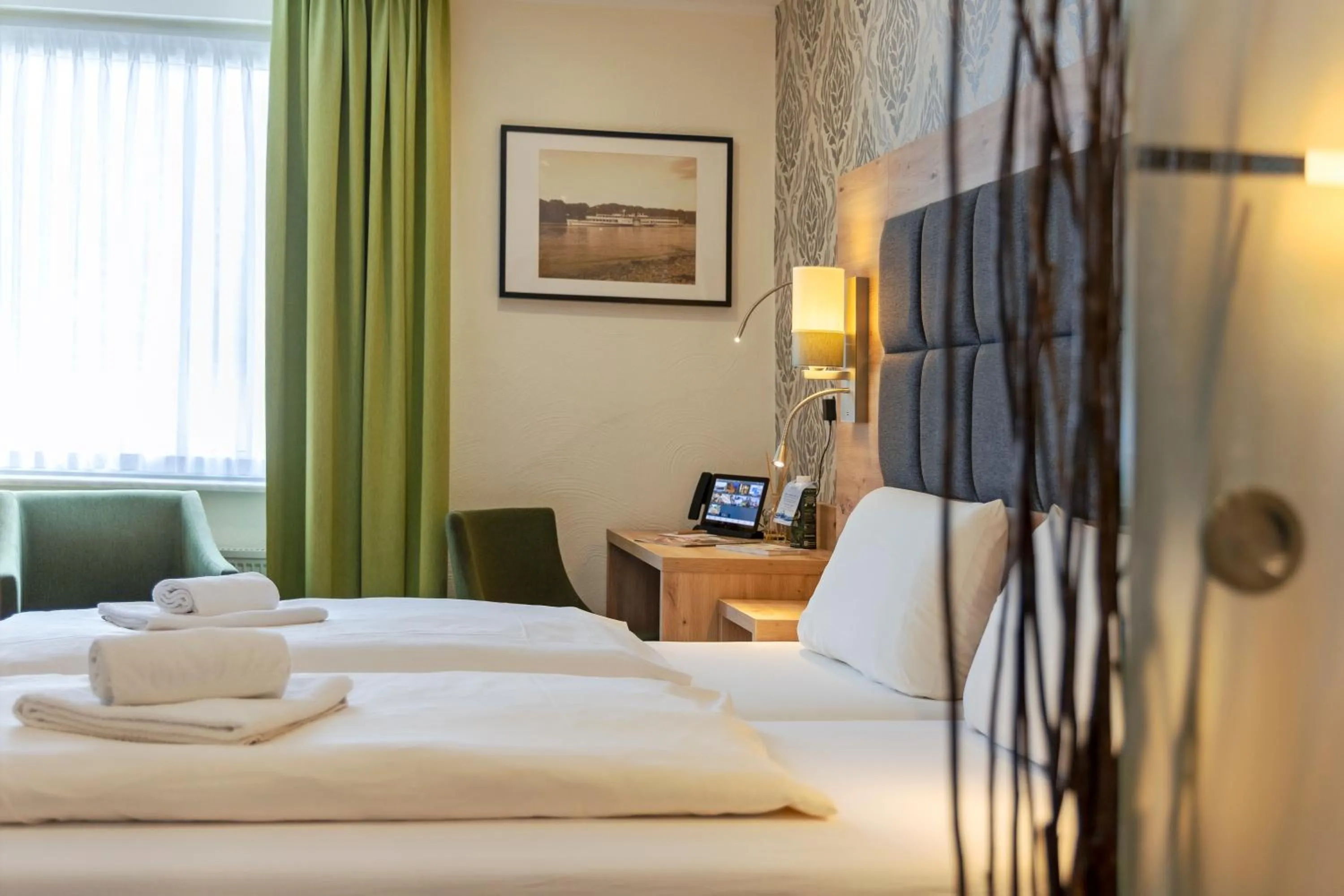 Bed in AKZENT Hotel Restaurant Roter Ochse Rhens bei Koblenz