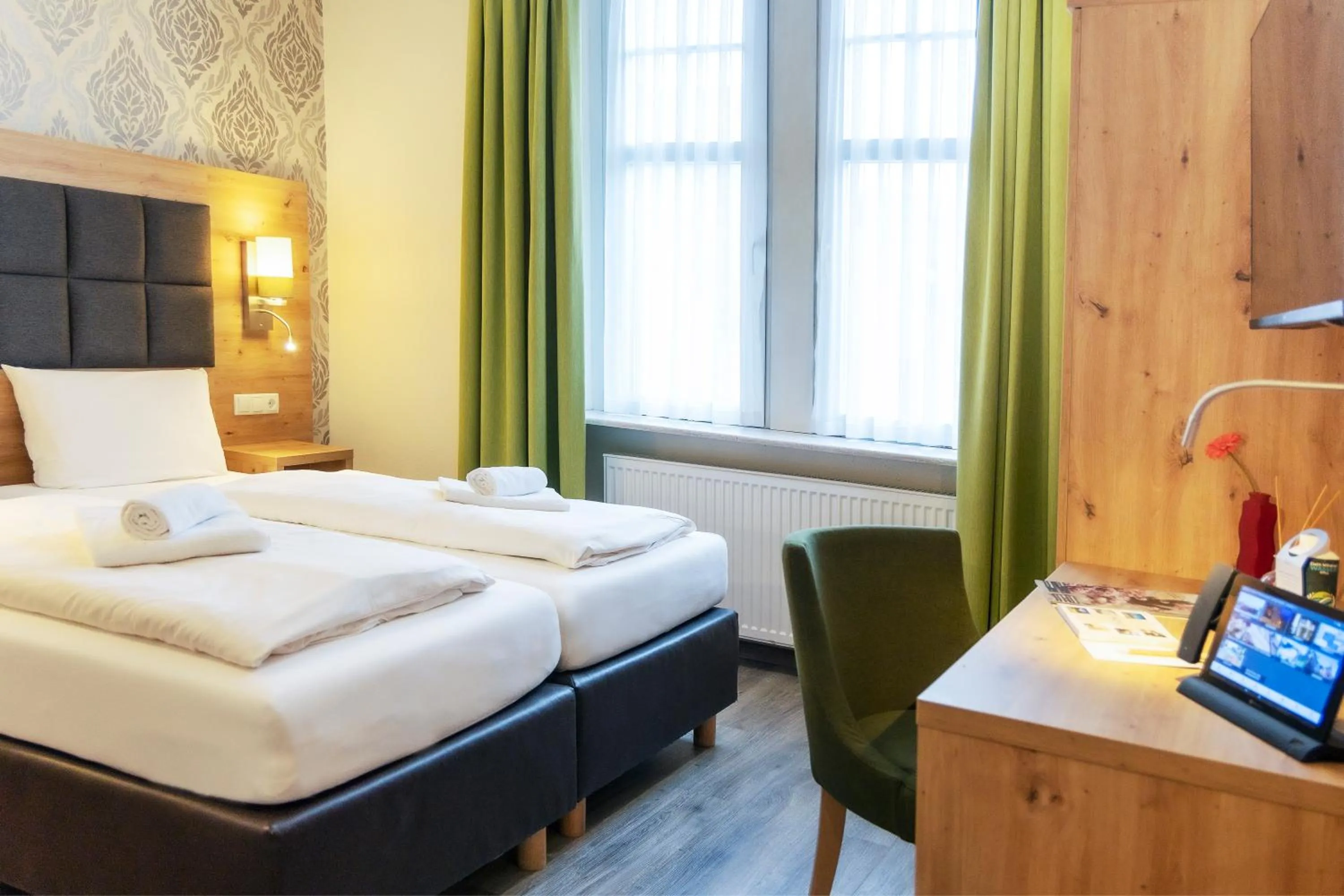 Bed in AKZENT Hotel Restaurant Roter Ochse Rhens bei Koblenz