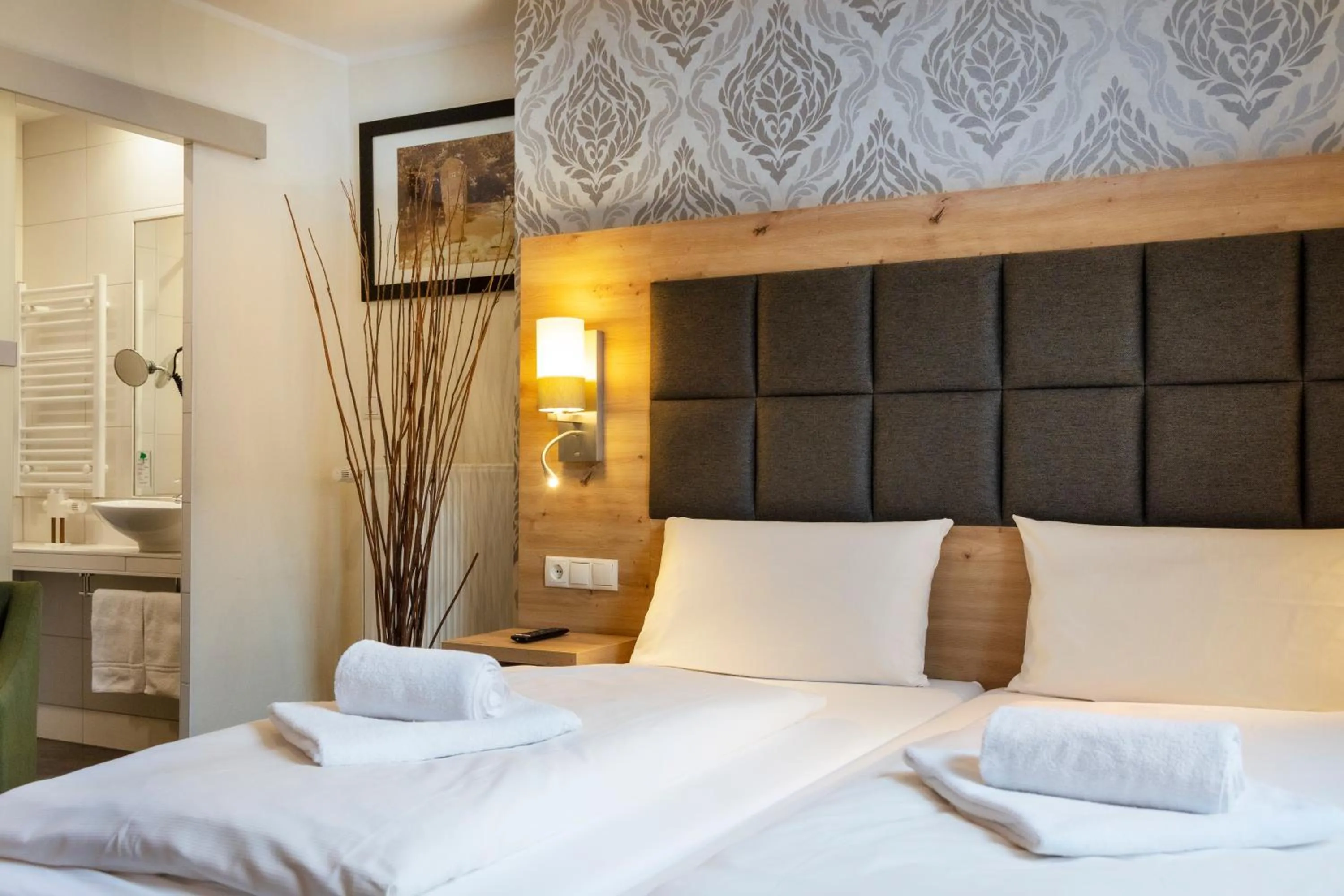 Bed in AKZENT Hotel Restaurant Roter Ochse Rhens bei Koblenz