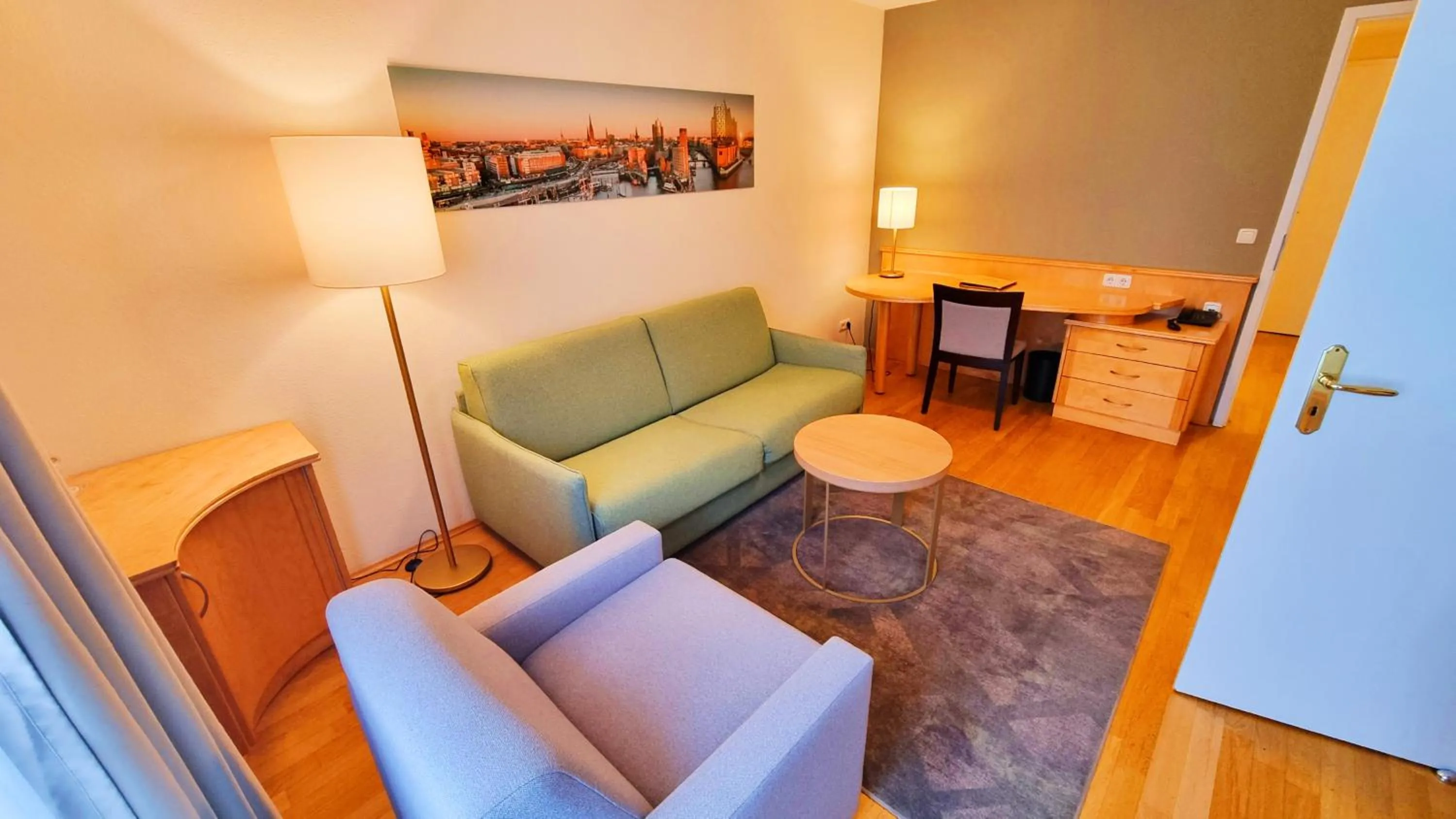 Photo of the whole room in New Living Home Residenzhotel Hamburg