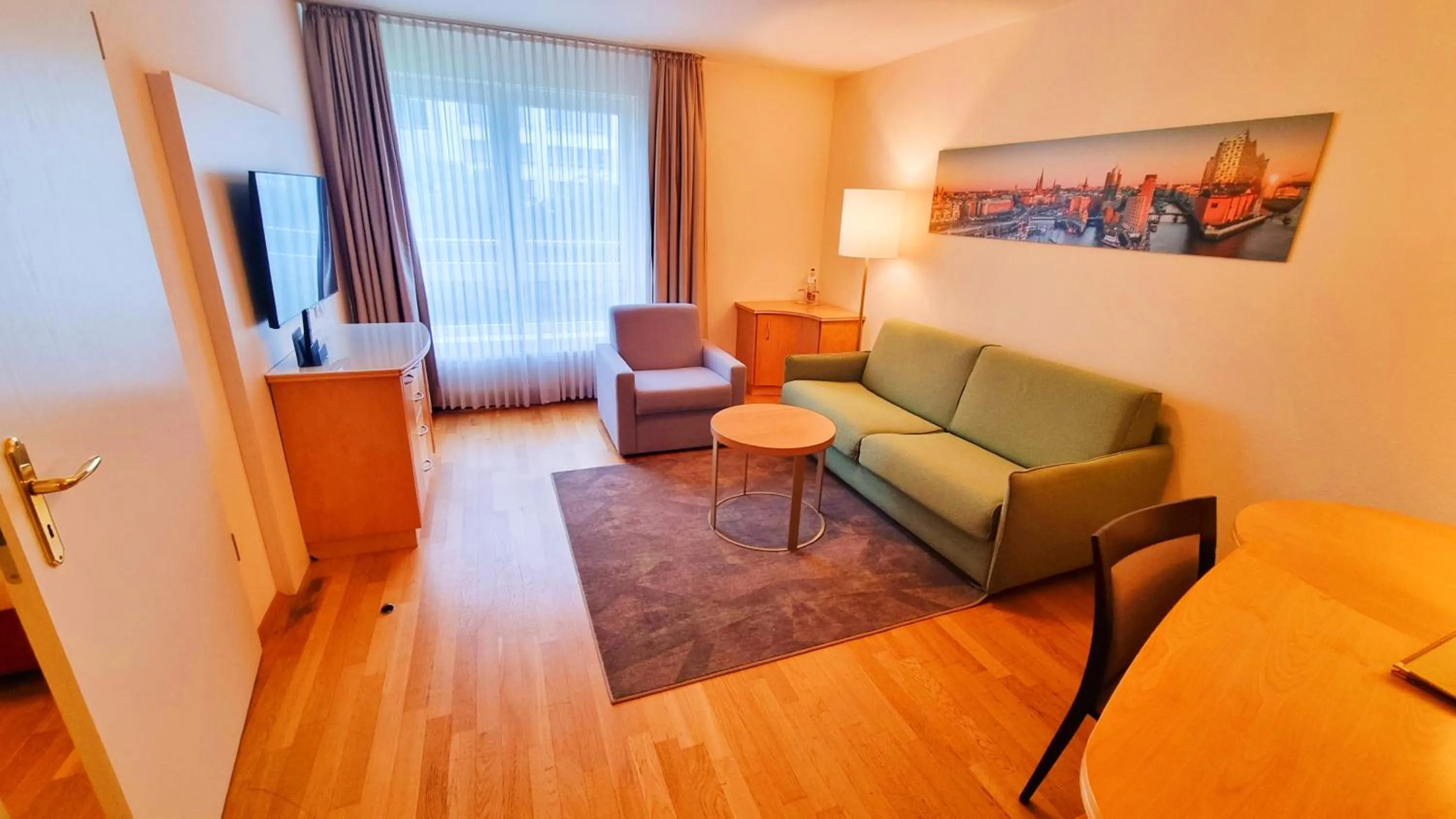 Photo of the whole room in New Living Home Residenzhotel Hamburg