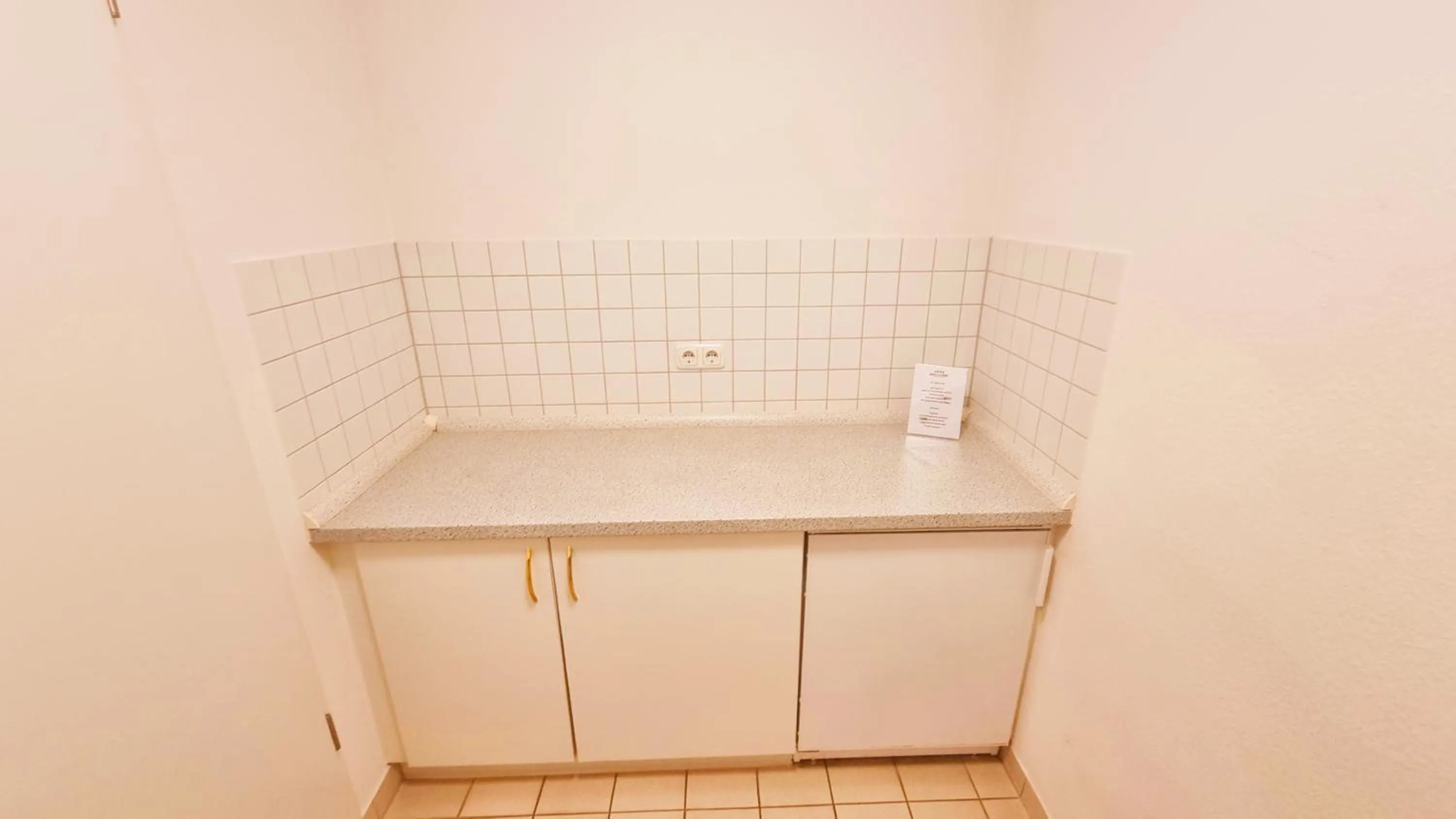 Kitchen or kitchenette in New Living Home Residenzhotel Hamburg