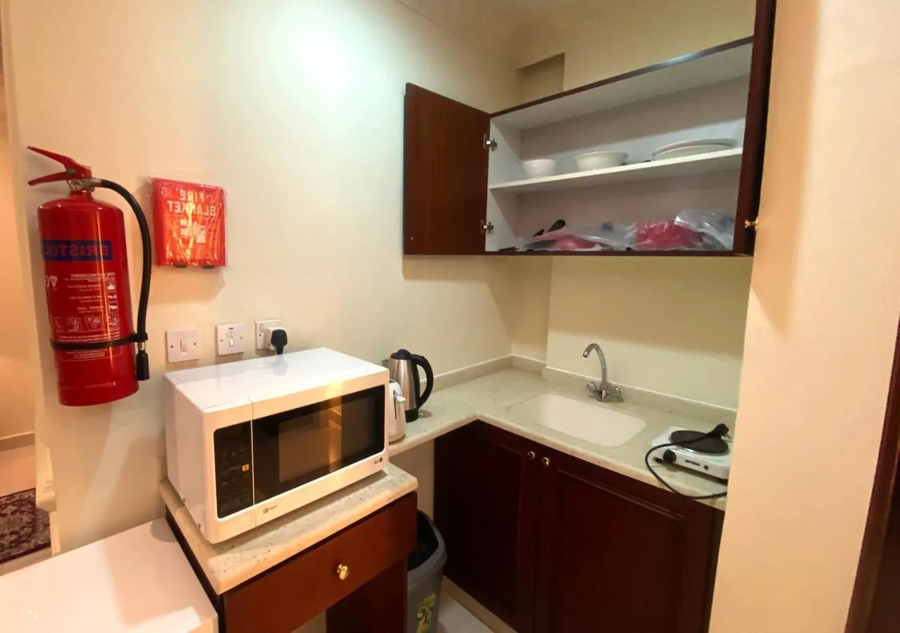 Kitchen or kitchenette in Majestic Hotel