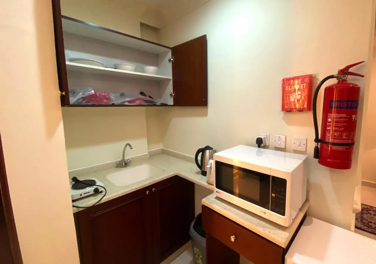 Kitchen or kitchenette in Majestic Hotel