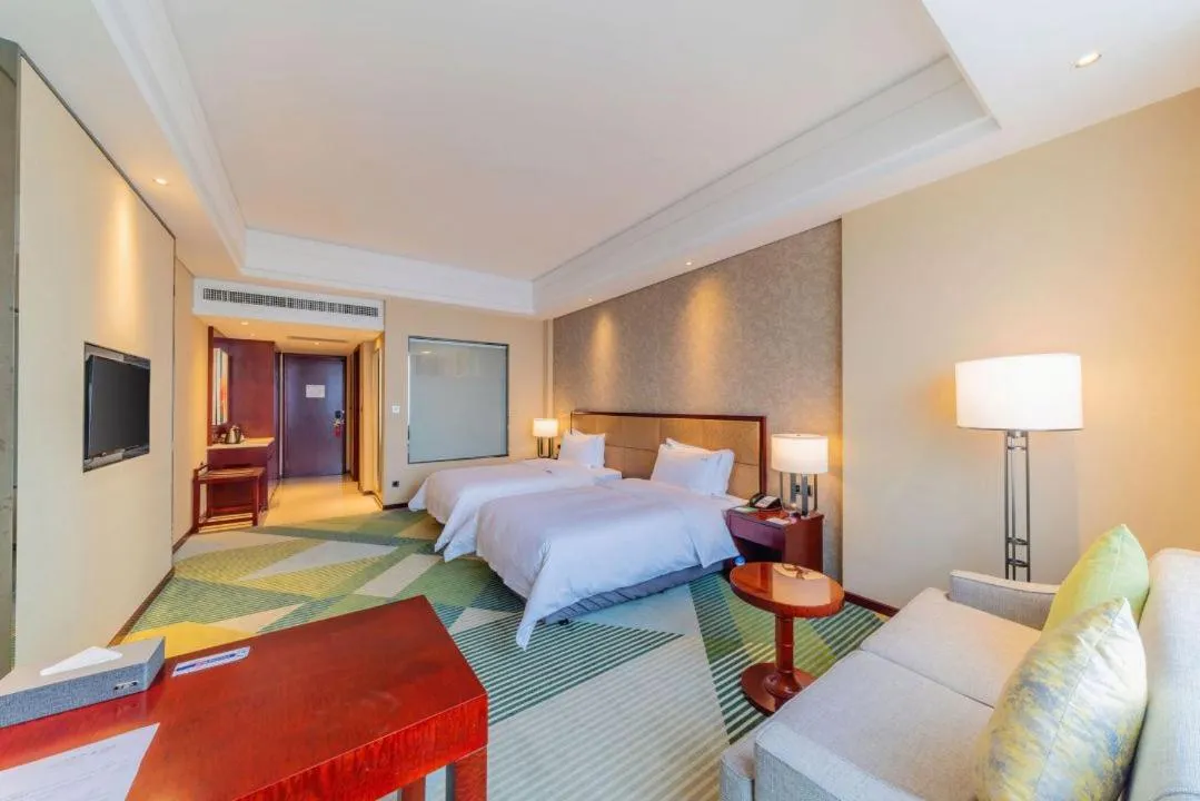 Photo of the whole room, Bed in Holiday Inn Foshan Nanhai Central by IHG