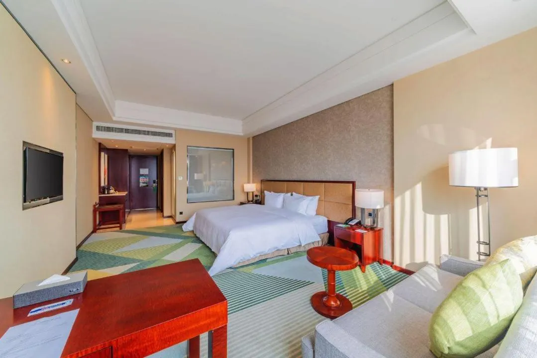 Photo of the whole room, Bed in Holiday Inn Foshan Nanhai Central by IHG