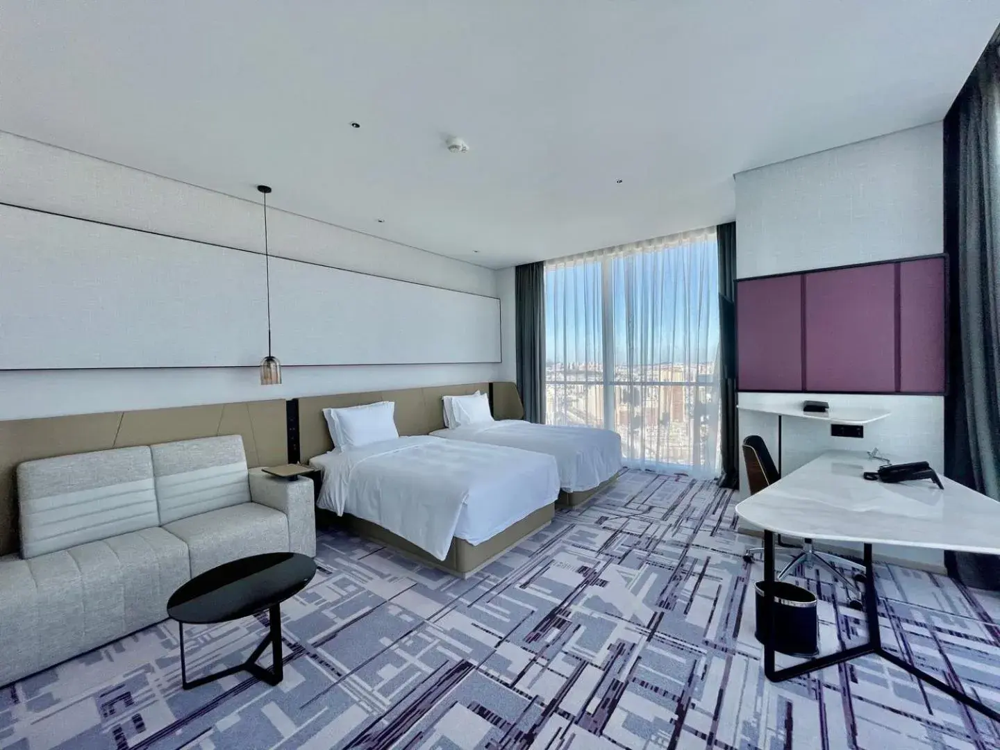 Bed in Crowne Plaza Dalian Xinghai by IHG Bed in Crowne Plaza Dalian Xinghai by IHG