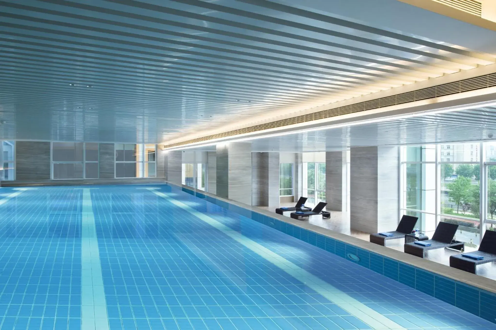 Swimming pool in Crowne Plaza Dalian Xinghai by IHG Swimming pool in Crowne Plaza Dalian Xinghai by IHG