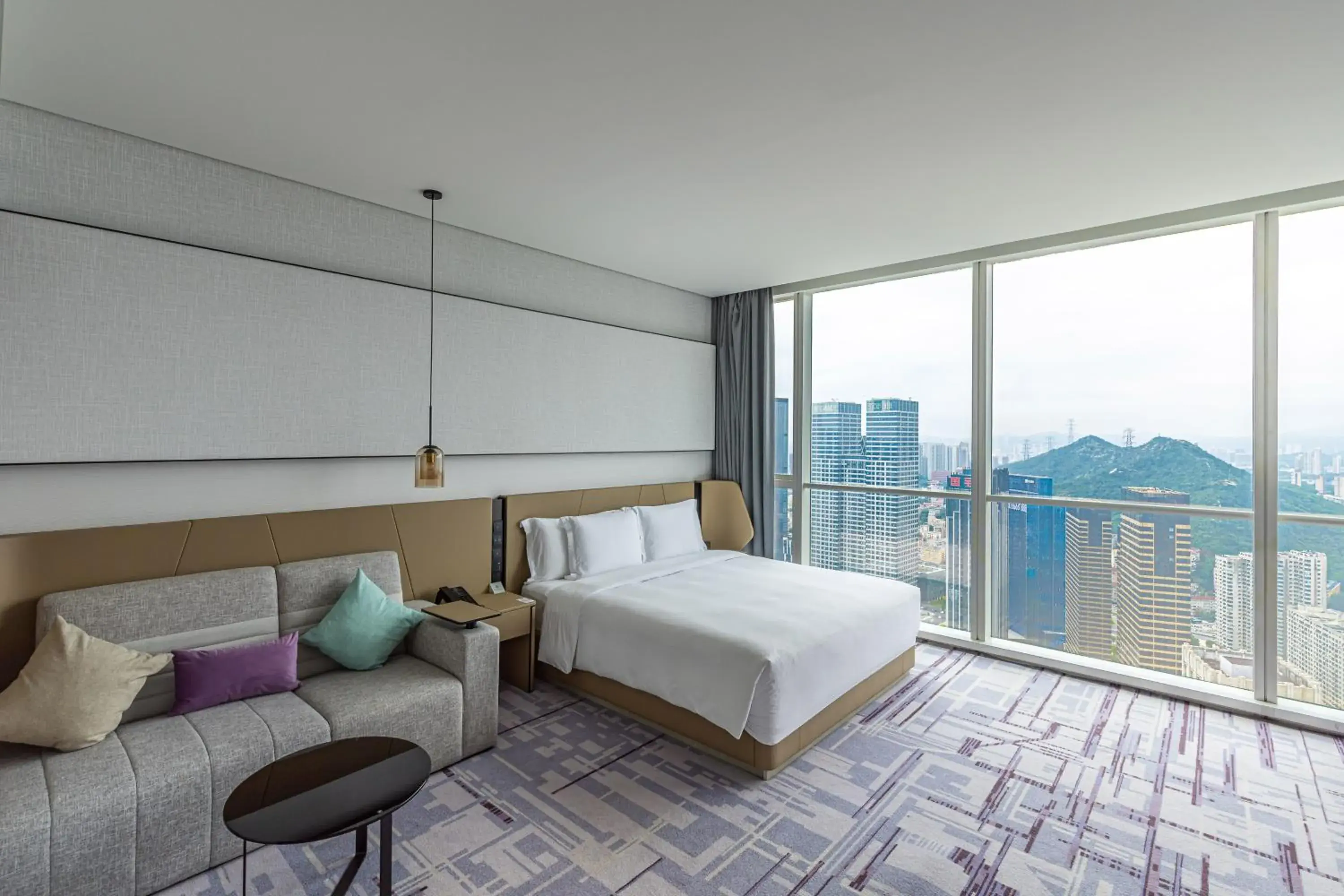 Bed in Crowne Plaza Dalian Xinghai by IHG Bed in Crowne Plaza Dalian Xinghai by IHG