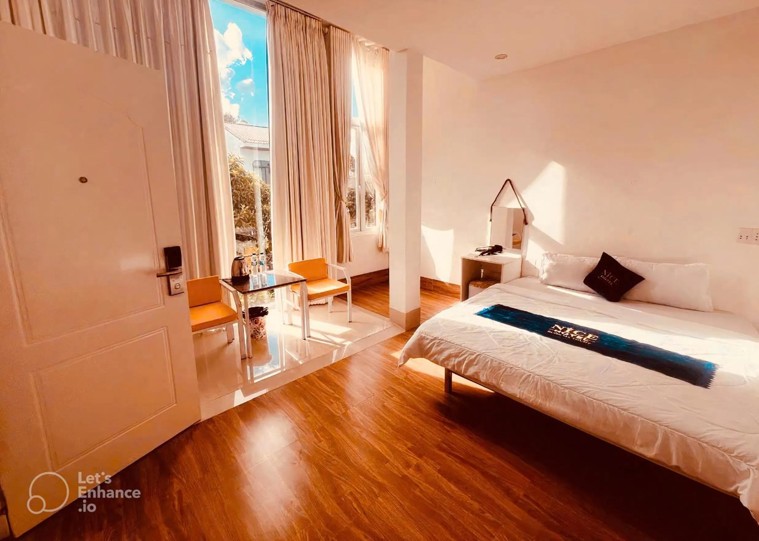 Photo of the whole room, Bed in Nice Hotel Buôn Ma Thuột