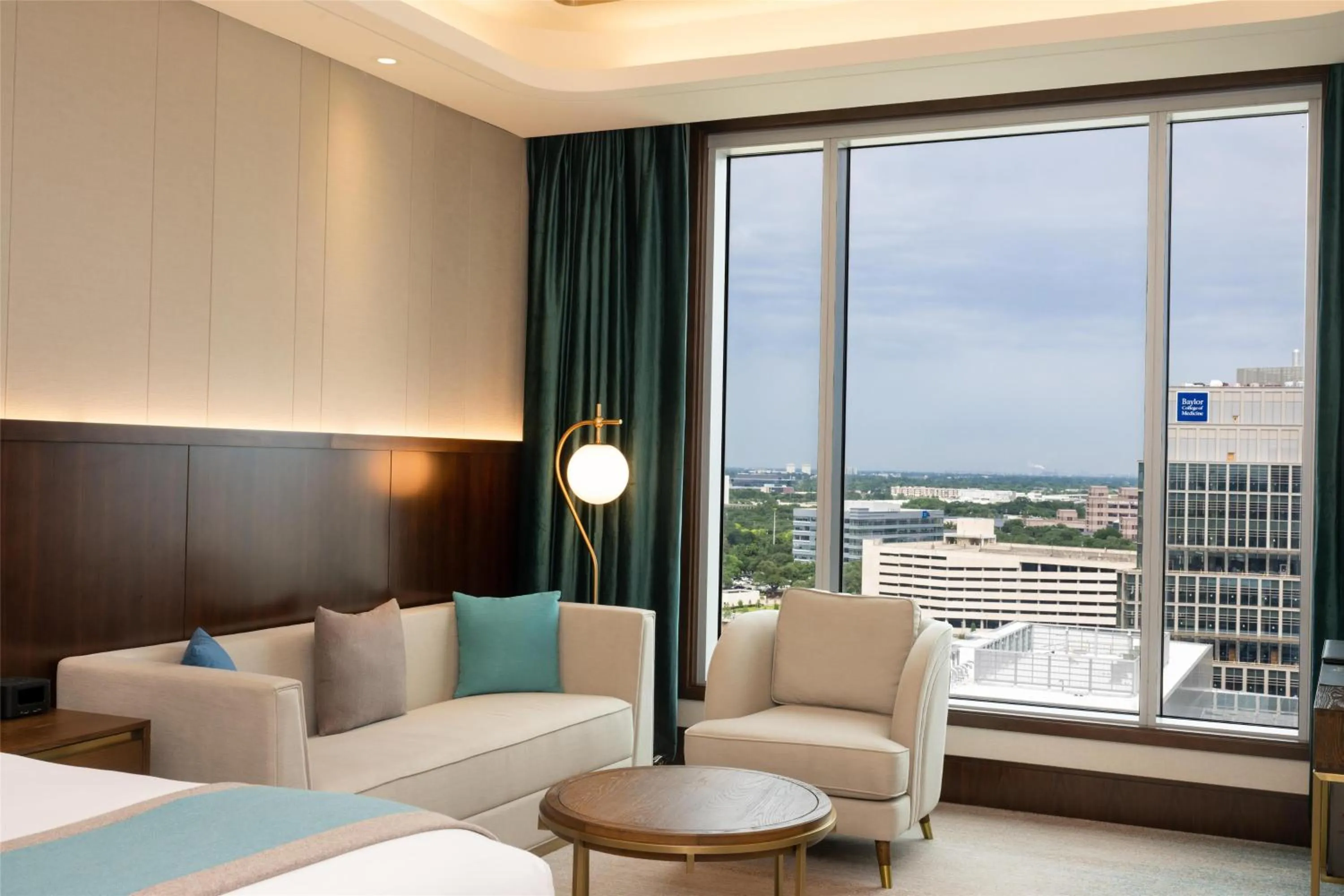 Living room, Bed in Blossom Hotel Houston, Curio Collection by Hilton