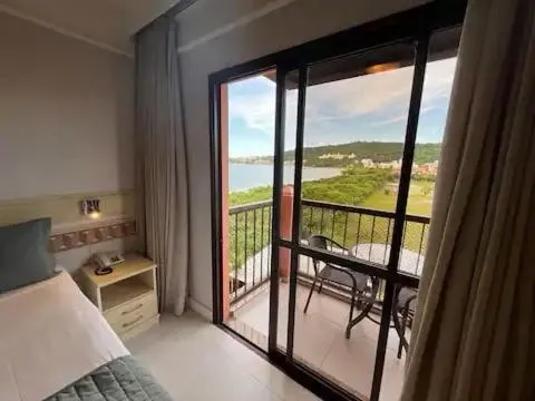 Bed in Studio à beira mar - Hotel Jurerê Beach Village